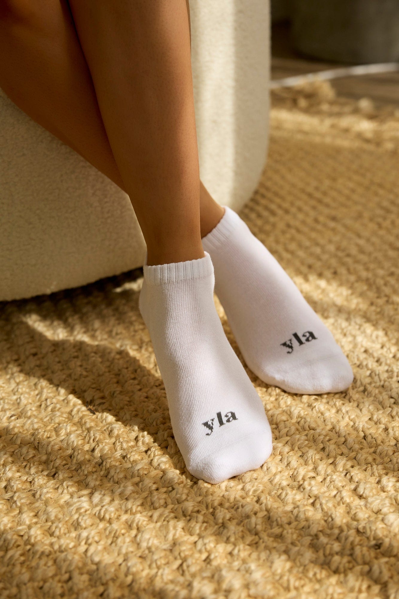 Woman wearing white ankle socks with sneakers for casual outfit