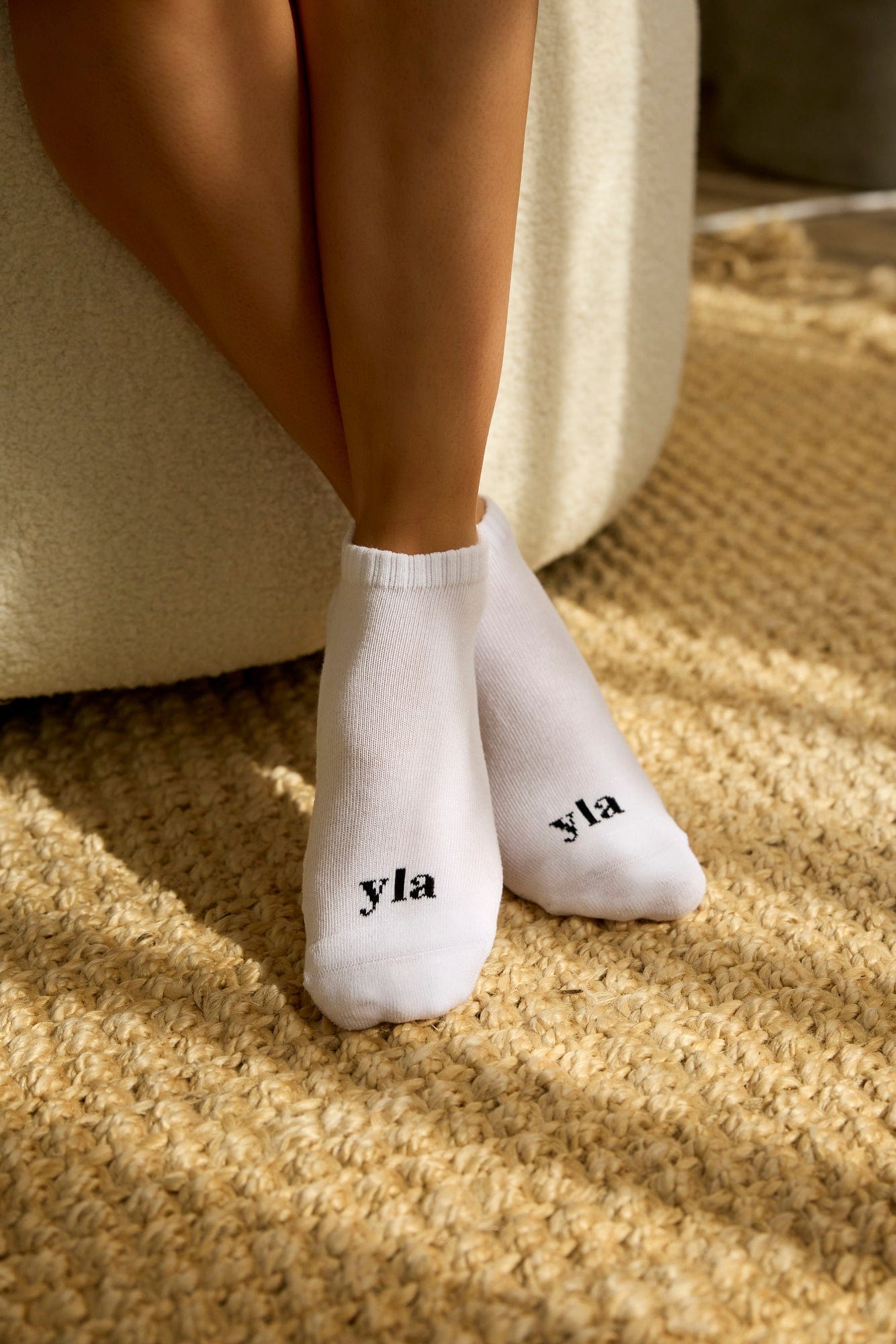 Men's ankle socks folded, showing breathable fabric texture