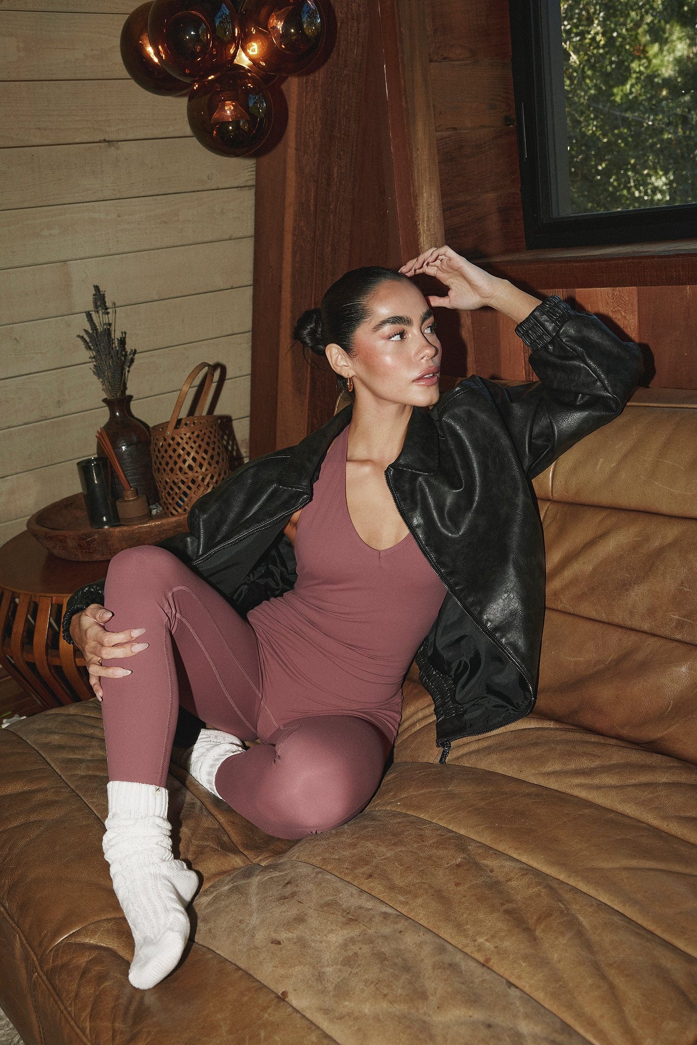 Close-up of the PU jackets texture, emphasizing its quality and trendy appeal.