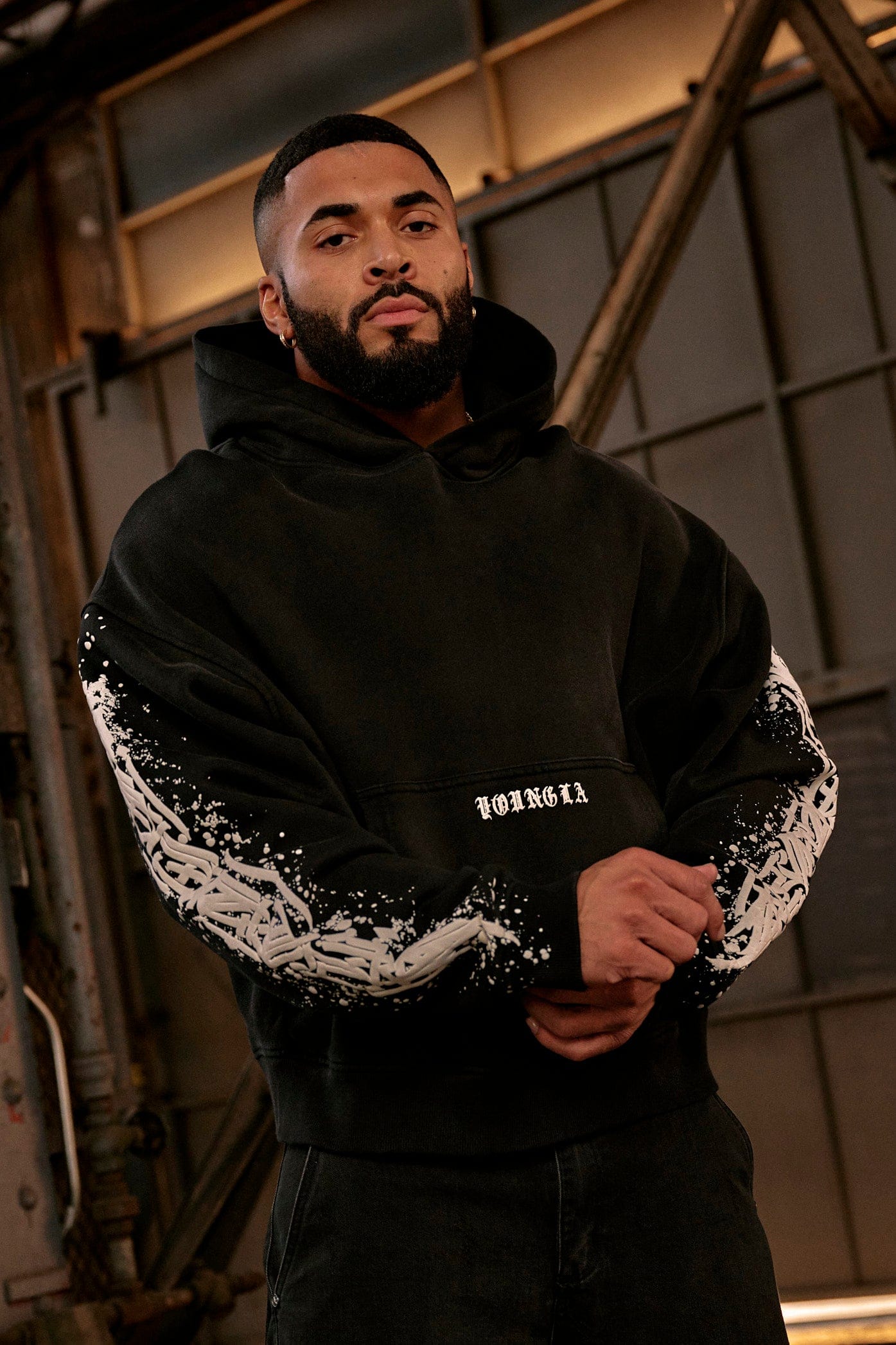 Front view of the Cyclone graphic zip-up hoodie showcasing its unique design.