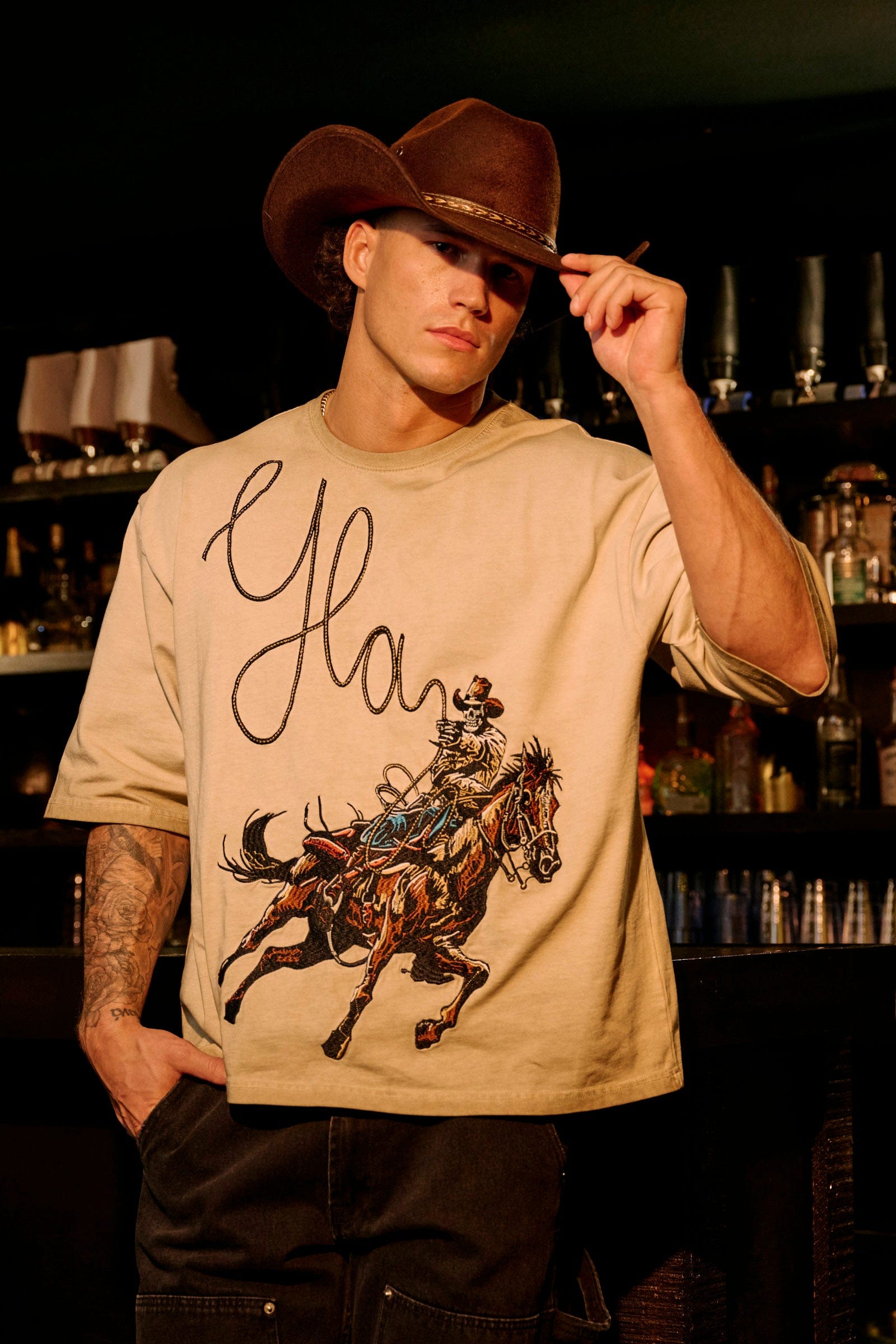 Front view of the vintage cowboy embroidered graphic tee.