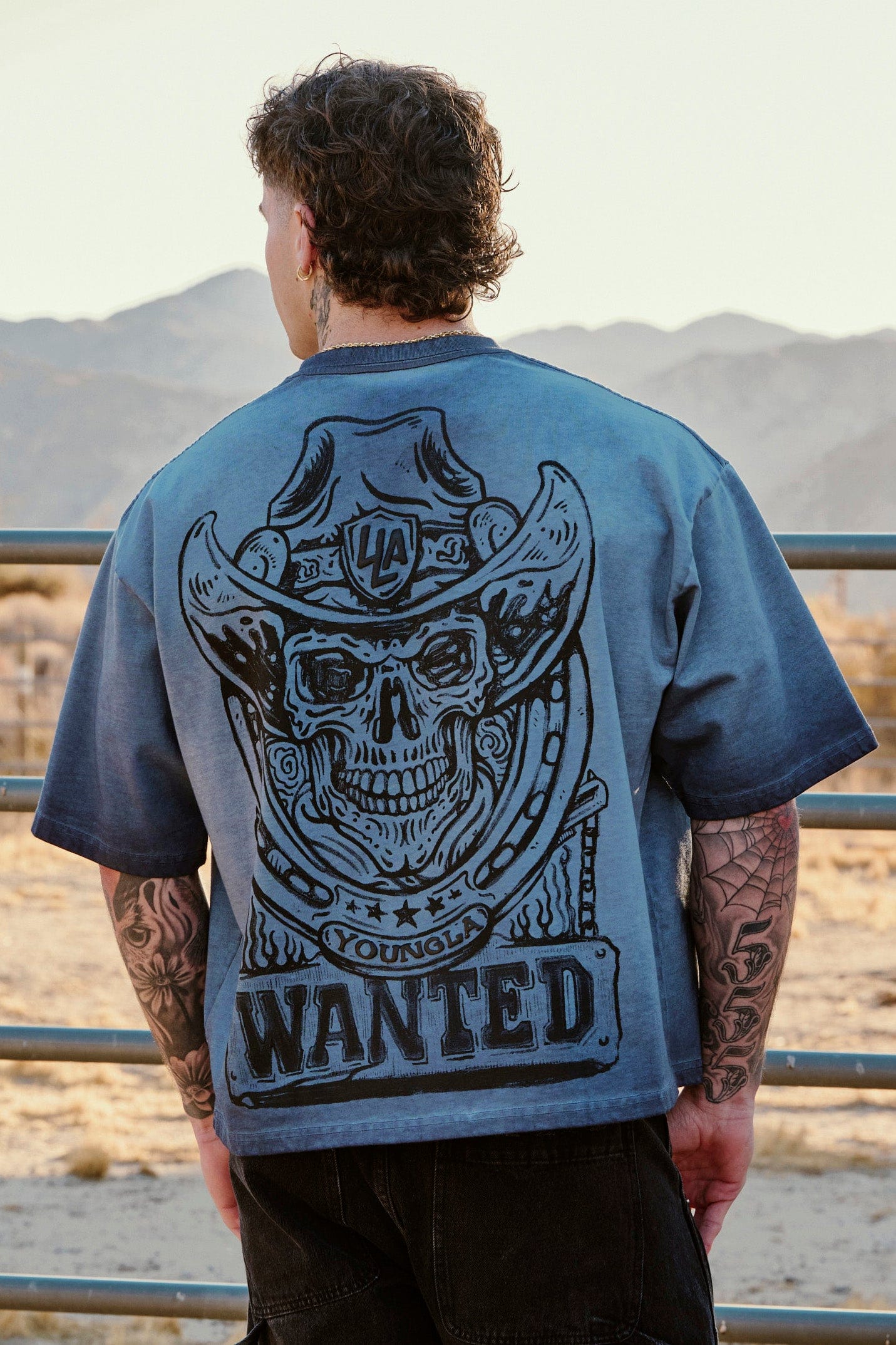 Front view of rugged Western graphic tee showcasing rodeo design.