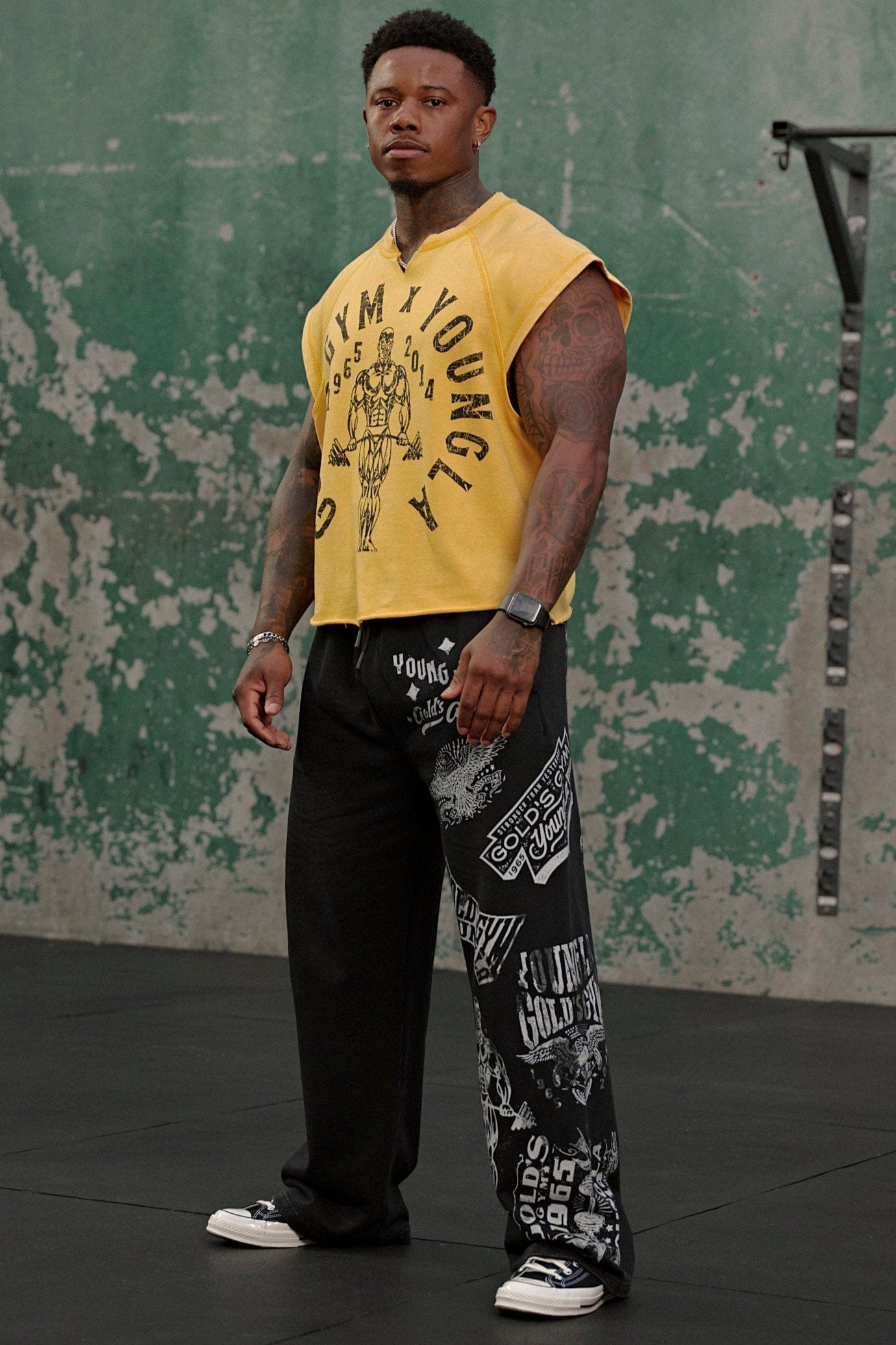 Side view of baggy grey sweatpants with YoungLA logo, perfect for gym wear.