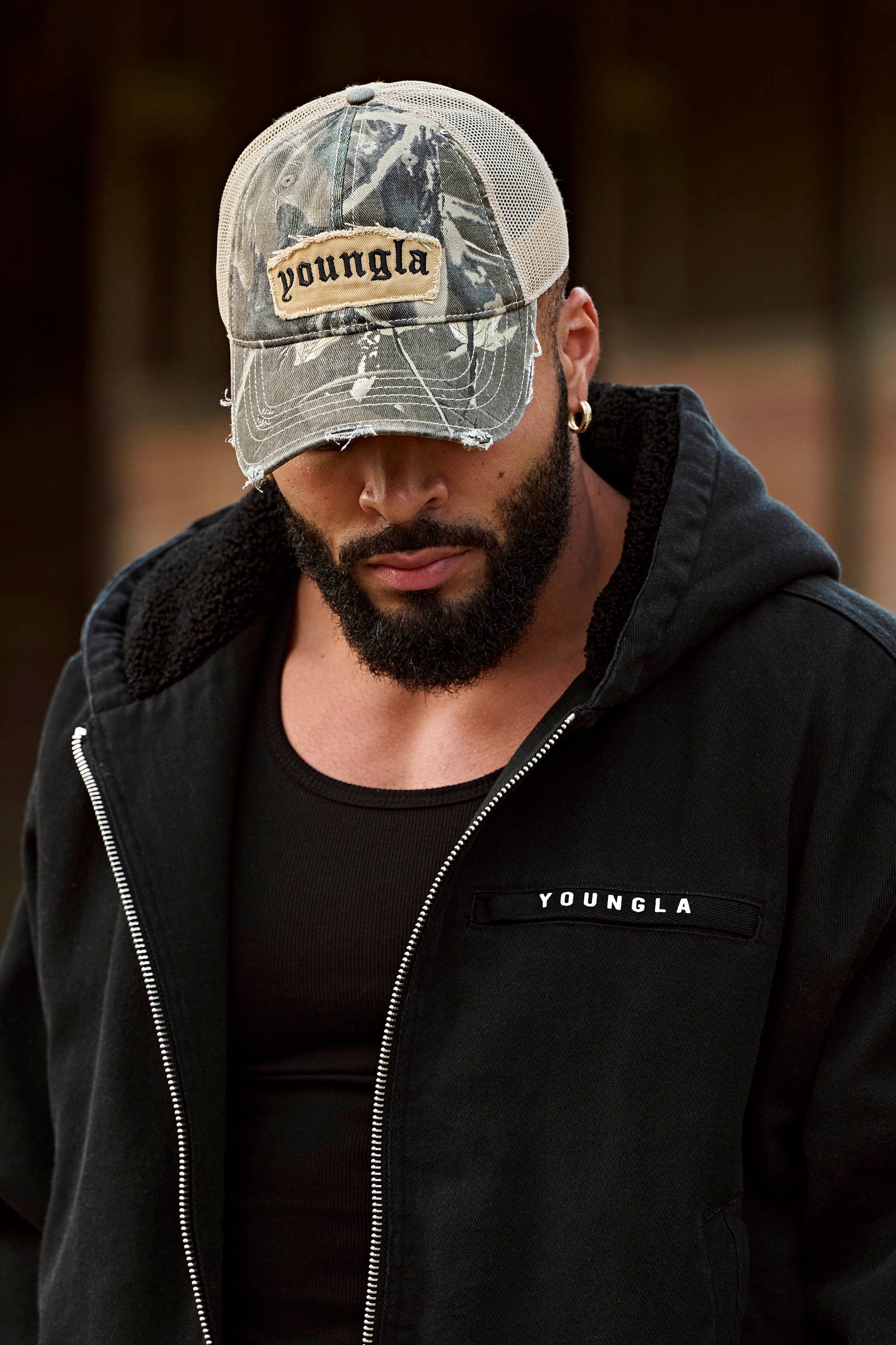 Front view of the retro vintage dad hat showcasing the distressed design.