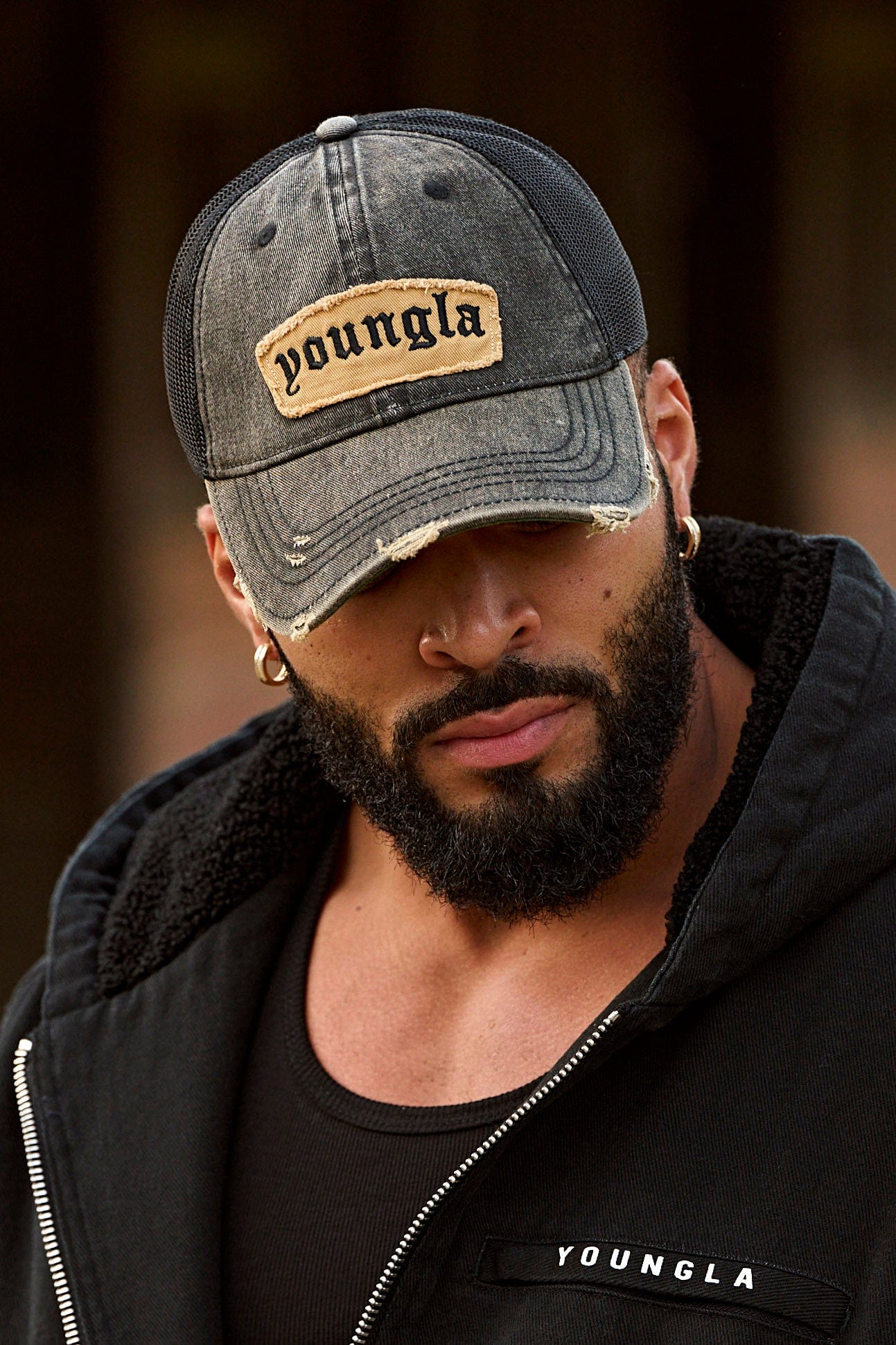Side angle of the dad hat highlighting the frayed logo patch.