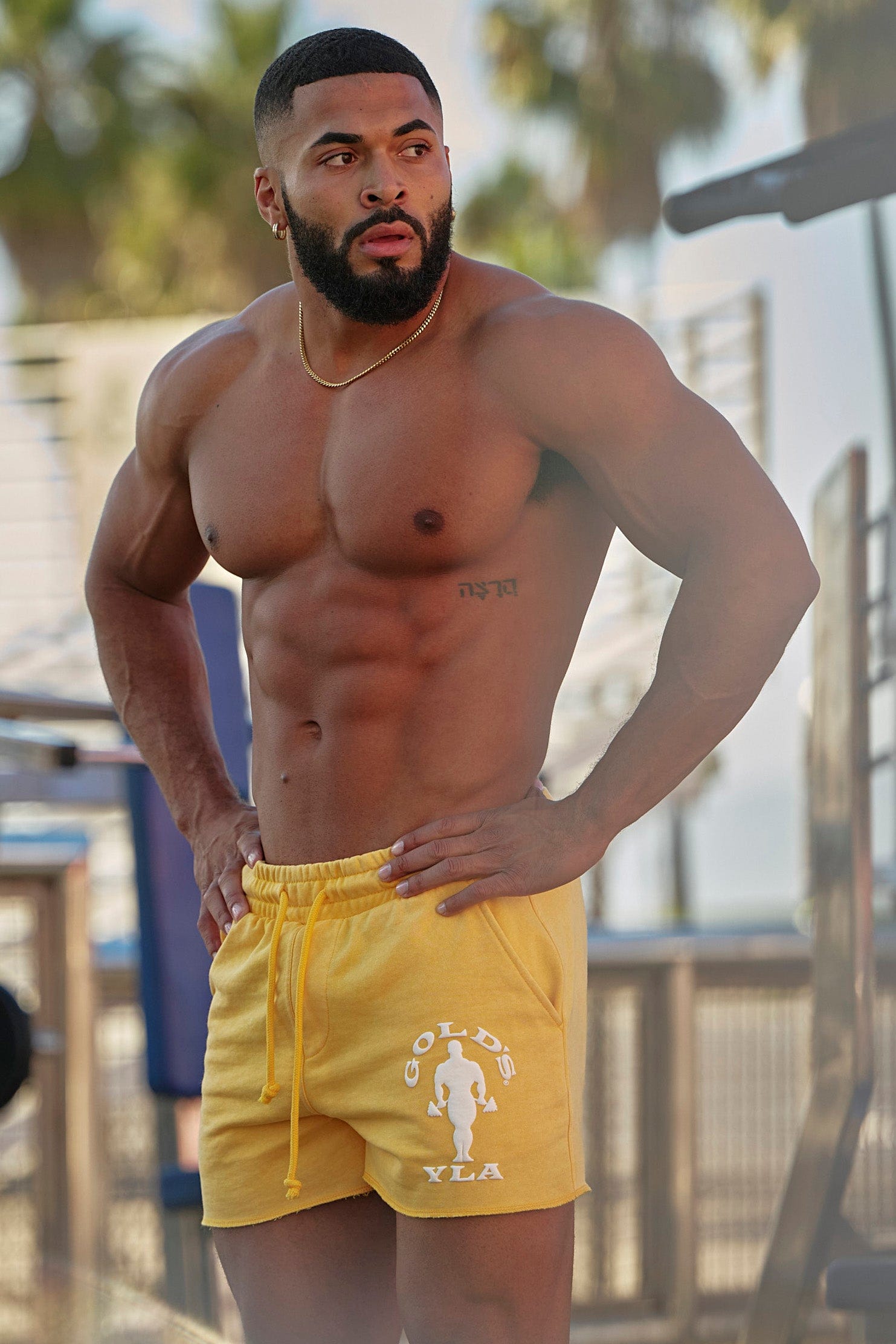 Dri fit shorts on model standing outdoors in warm Texas sunshine