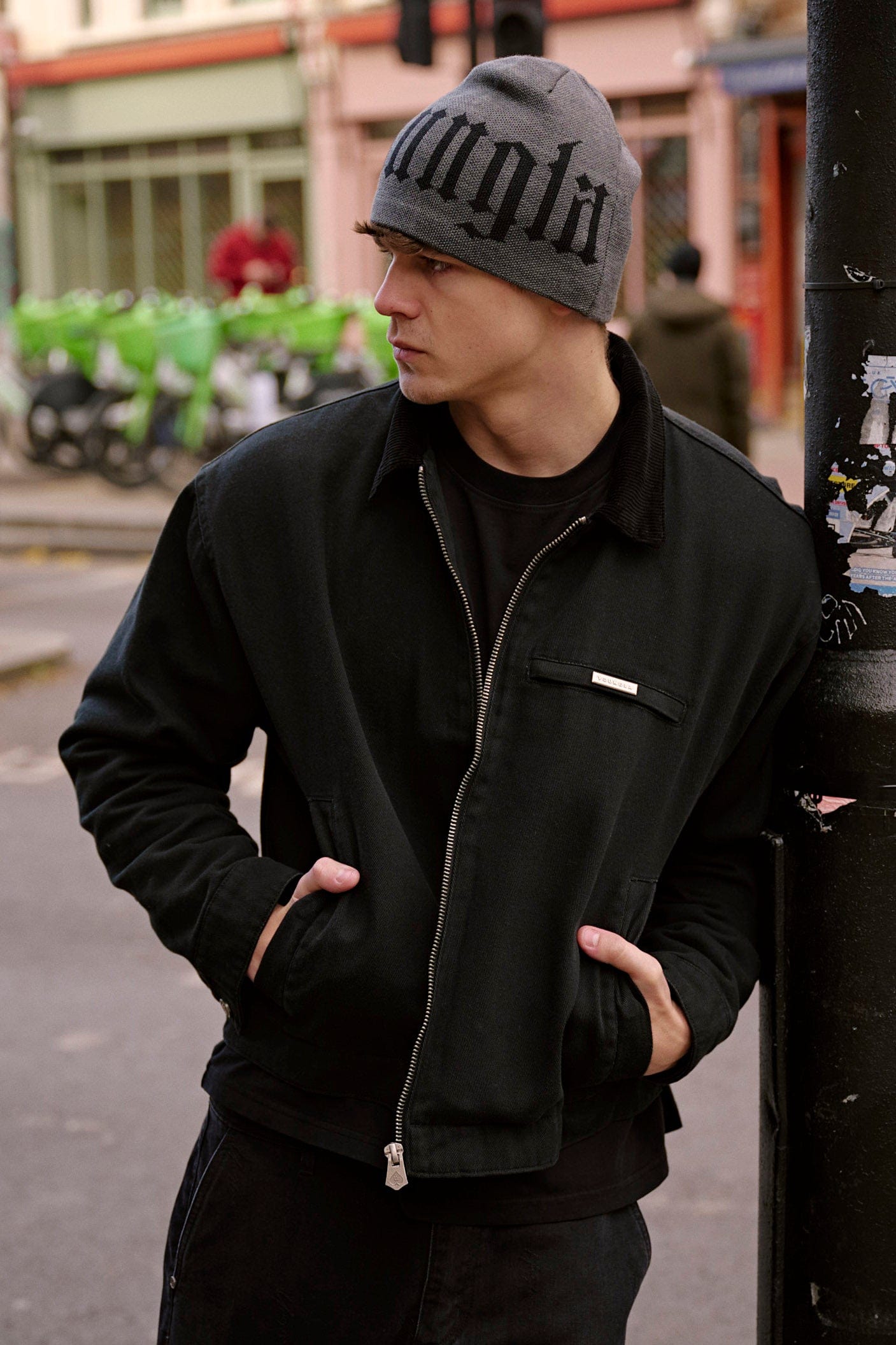 Stylish wool beanie displayed with winter outerwear, showing versatility.