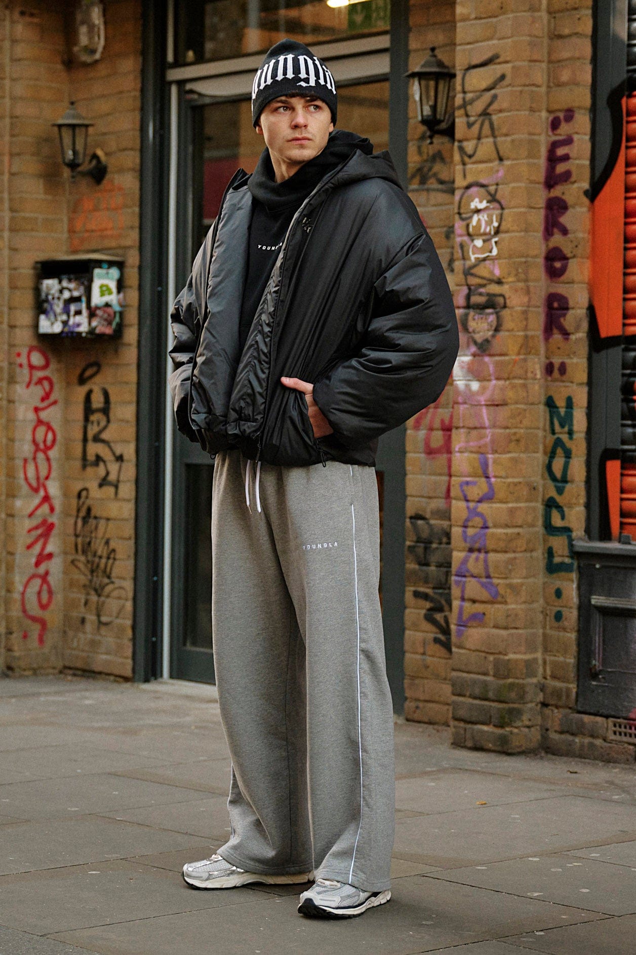 Front view of heavyweight cotton joggers with baggy fit and side piping