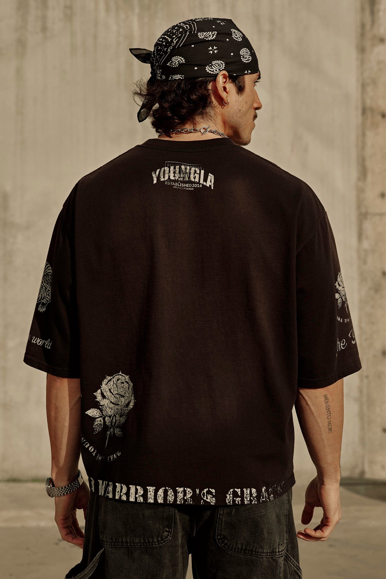 Side view of the Rebel Vintage Graphic Tee highlighting the distressed edges.