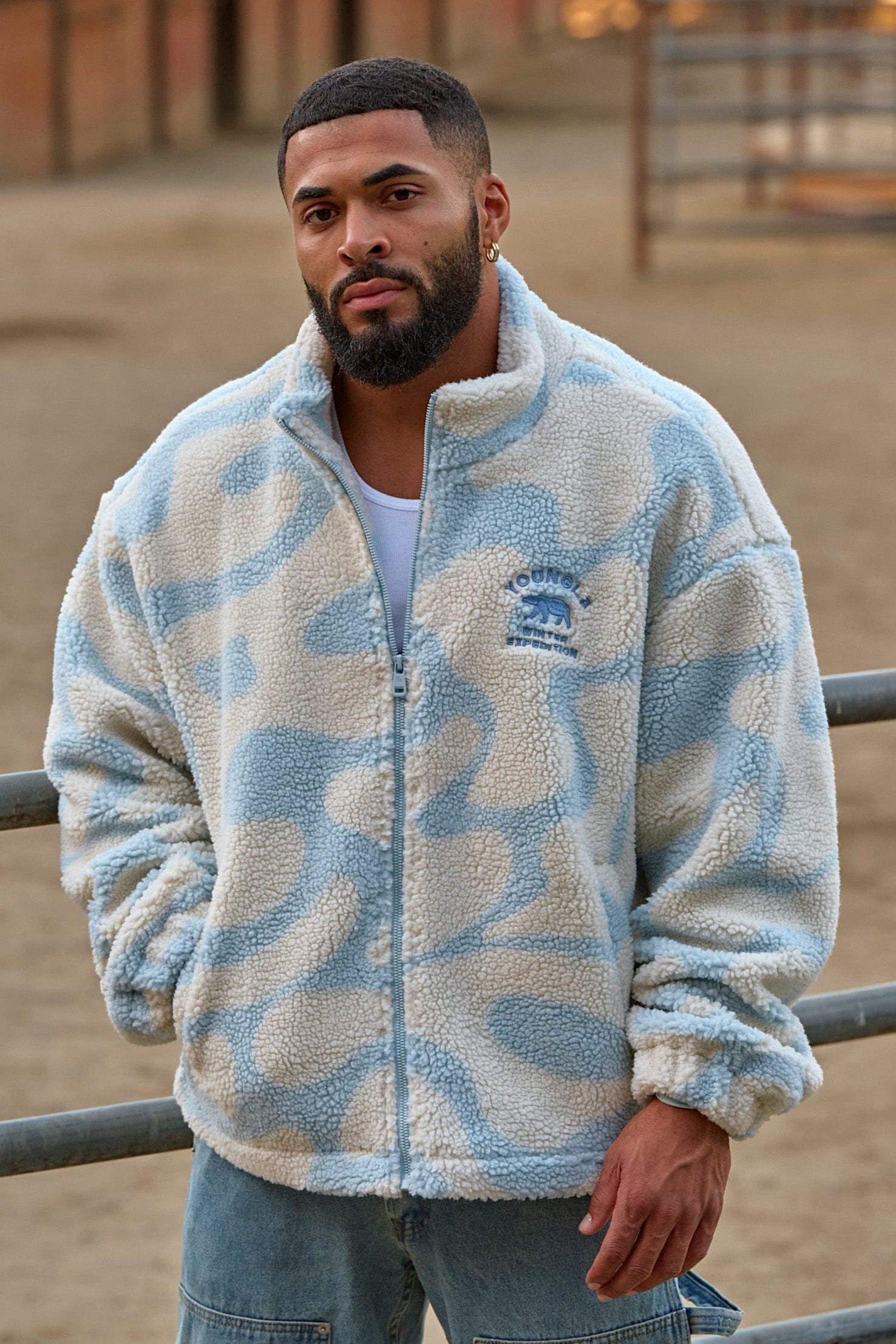 Model wearing the oversized sherpa jacket, demonstrating its stylish fit.