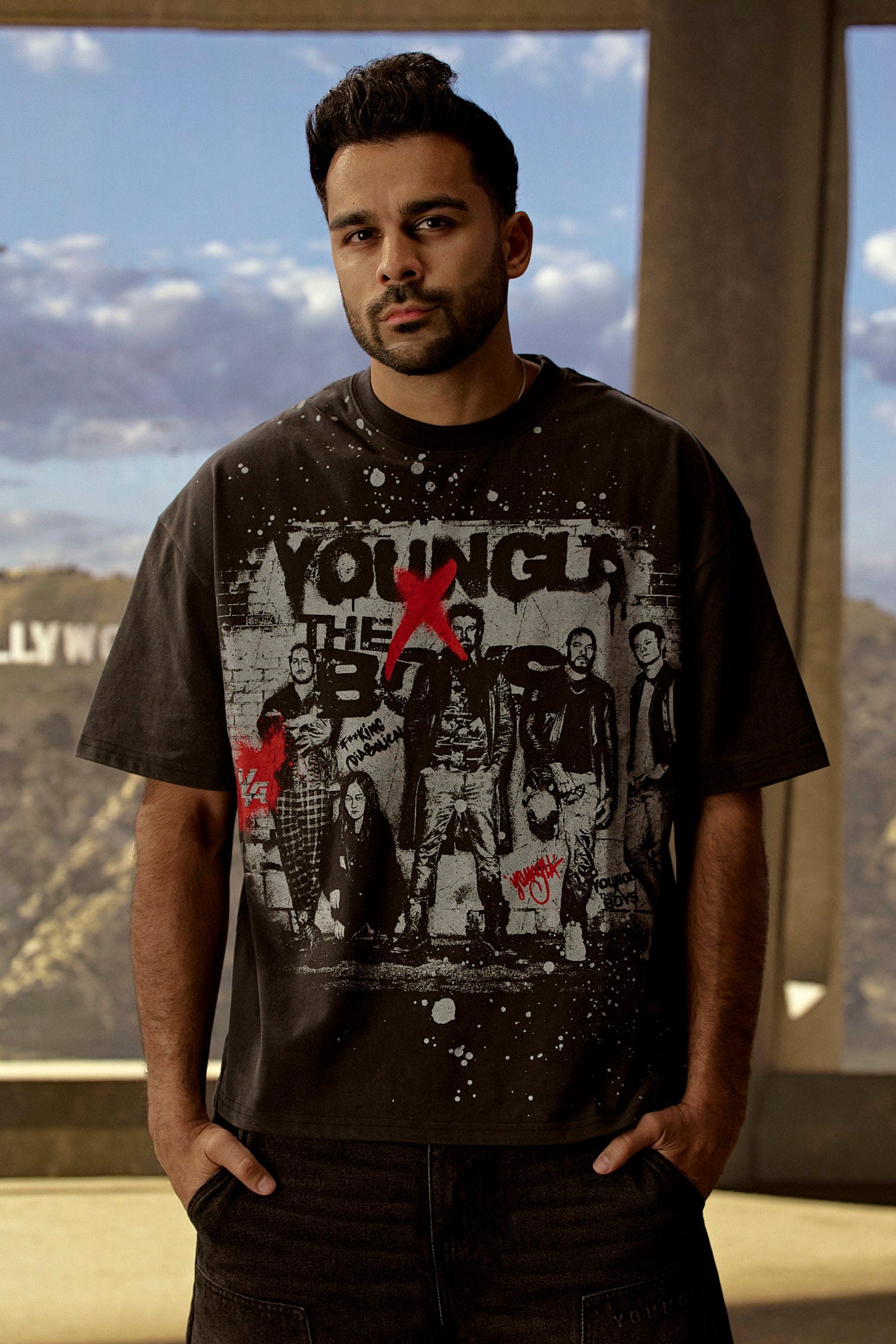 Side angle of a relaxed fit graphic tee for streetwear fans.