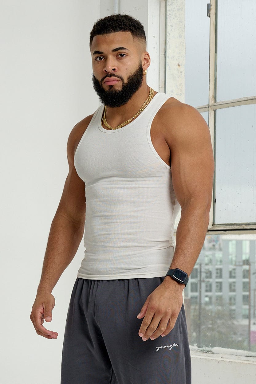 Front view of fitted white tank top worn during summer workout
