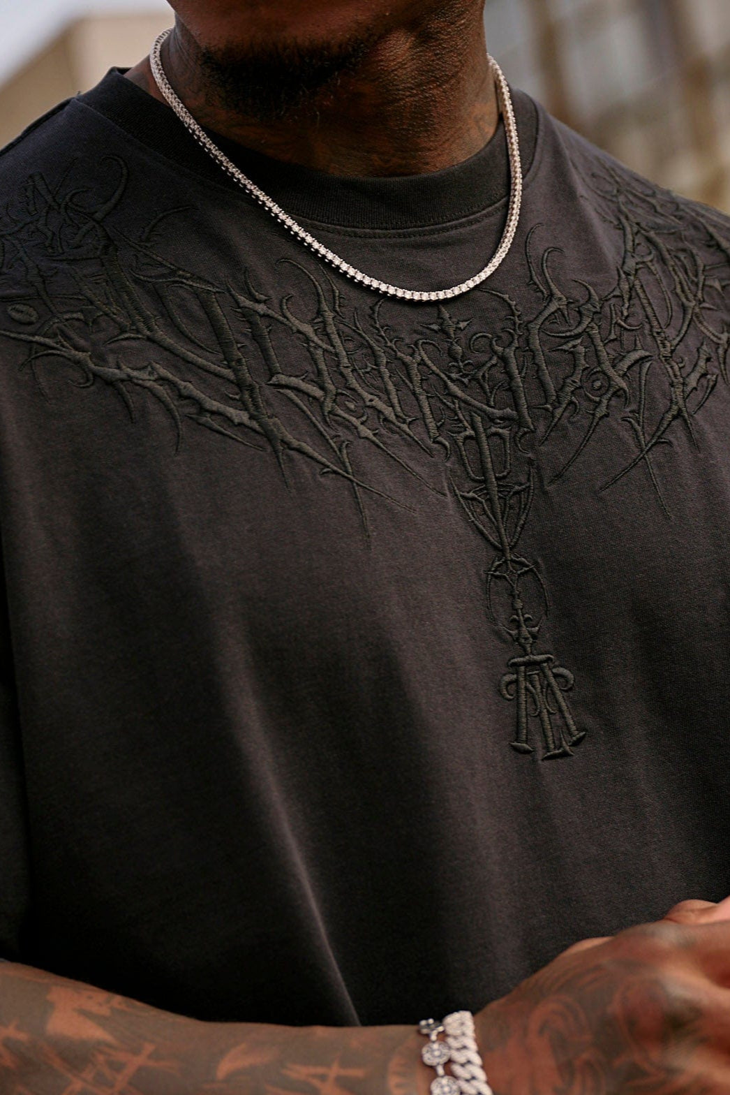 Model wearing relaxed-fit cotton t-shirt in urban setting