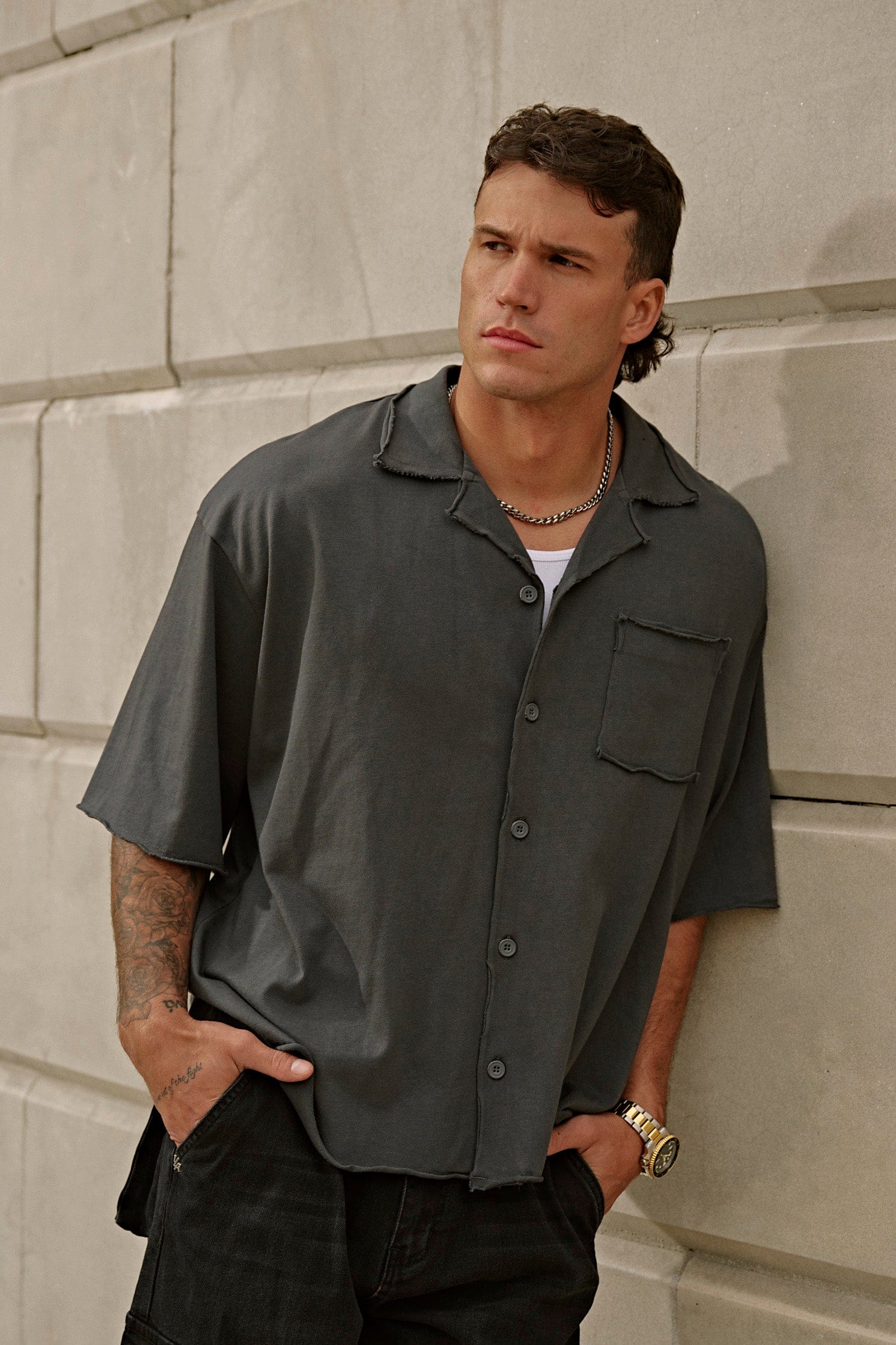 Front view of the Urban Edge oversized button up shirt on a model.