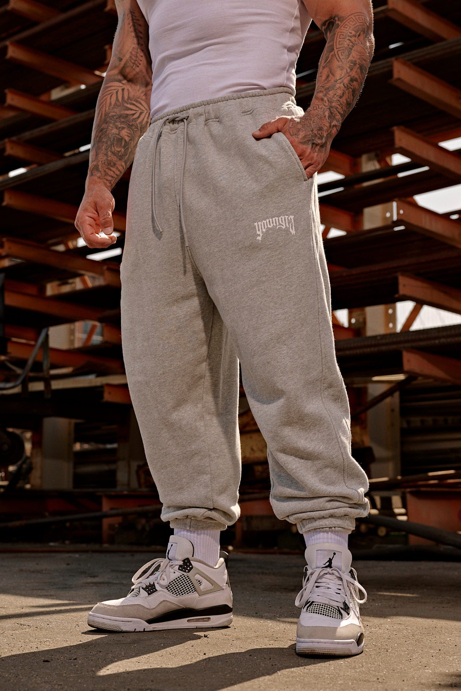 Side view of loose-fit anime joggers, ideal for gym activities.