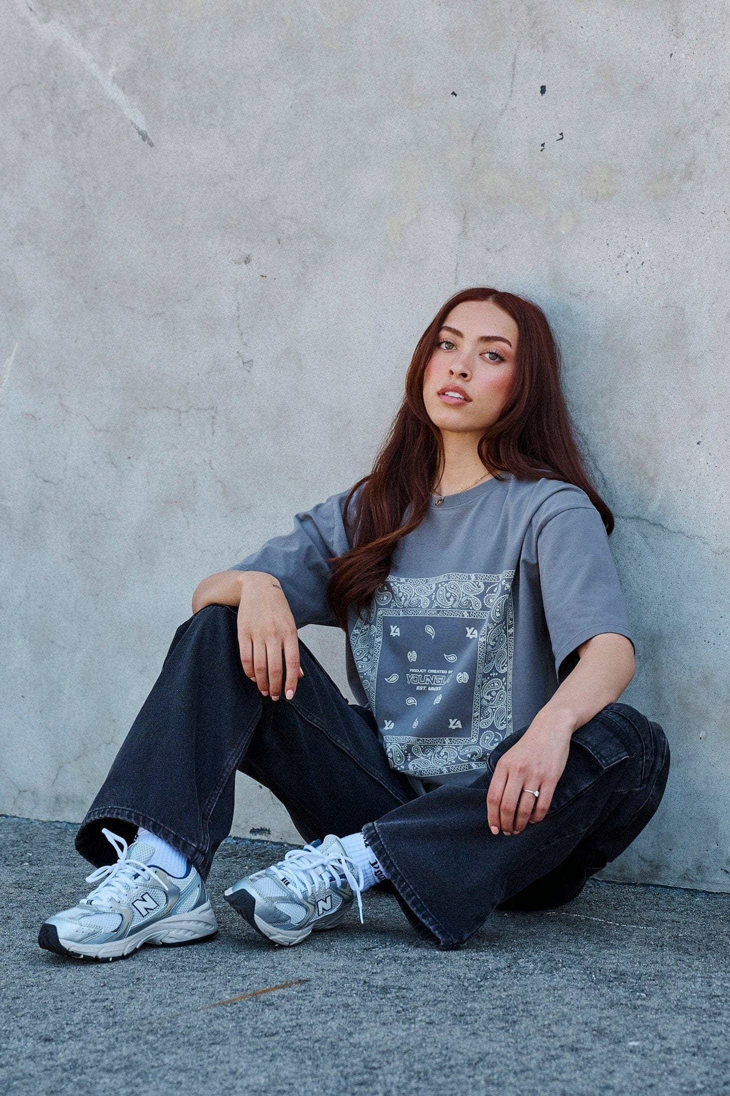 Side view showcasing the relaxed fit of the oversized t-shirt.