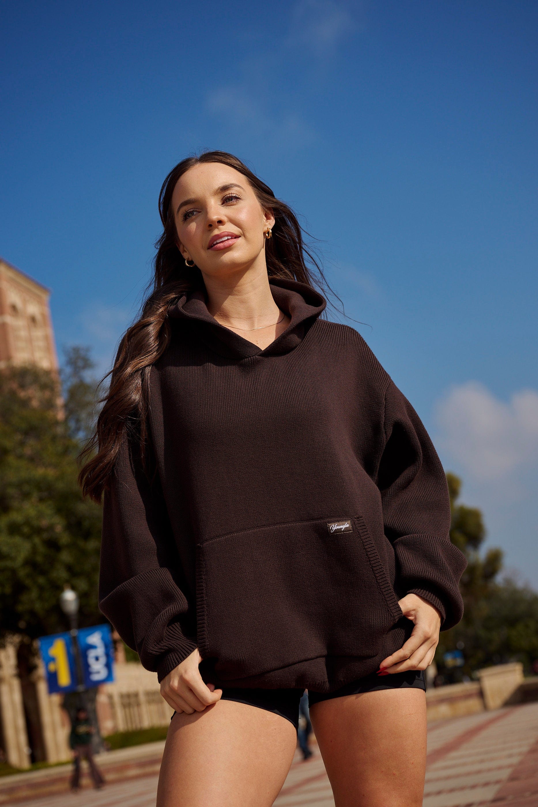 Close-up of YoungLA logo on the womens sweater hoodie.