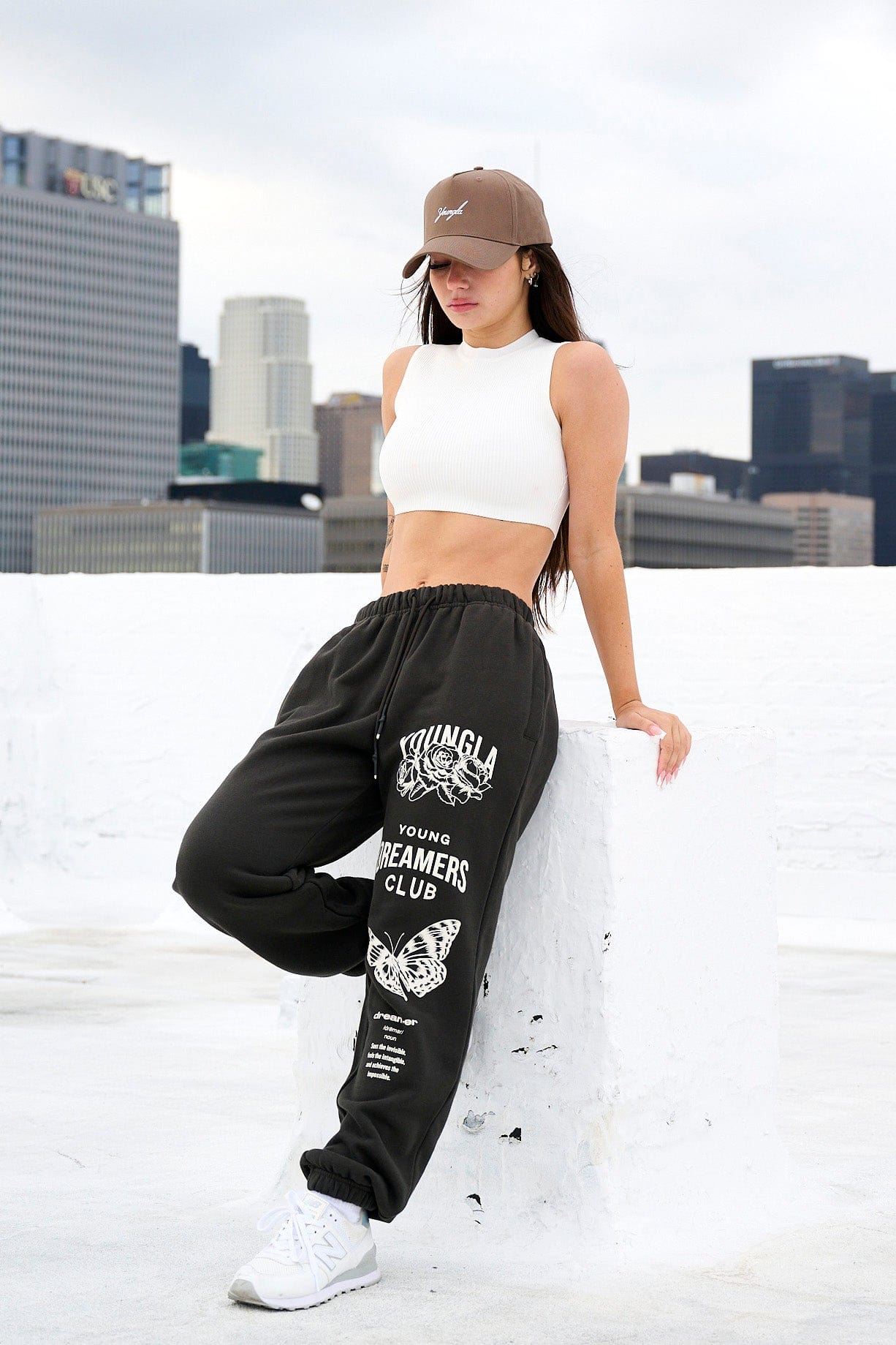 Close-up of young dreamers print on organic cotton joggers.