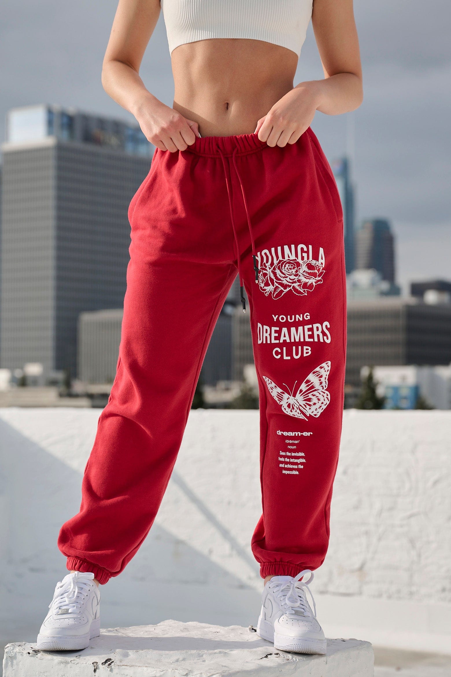 Front view of model in organic cotton joggers, perfect for athleisure wear.