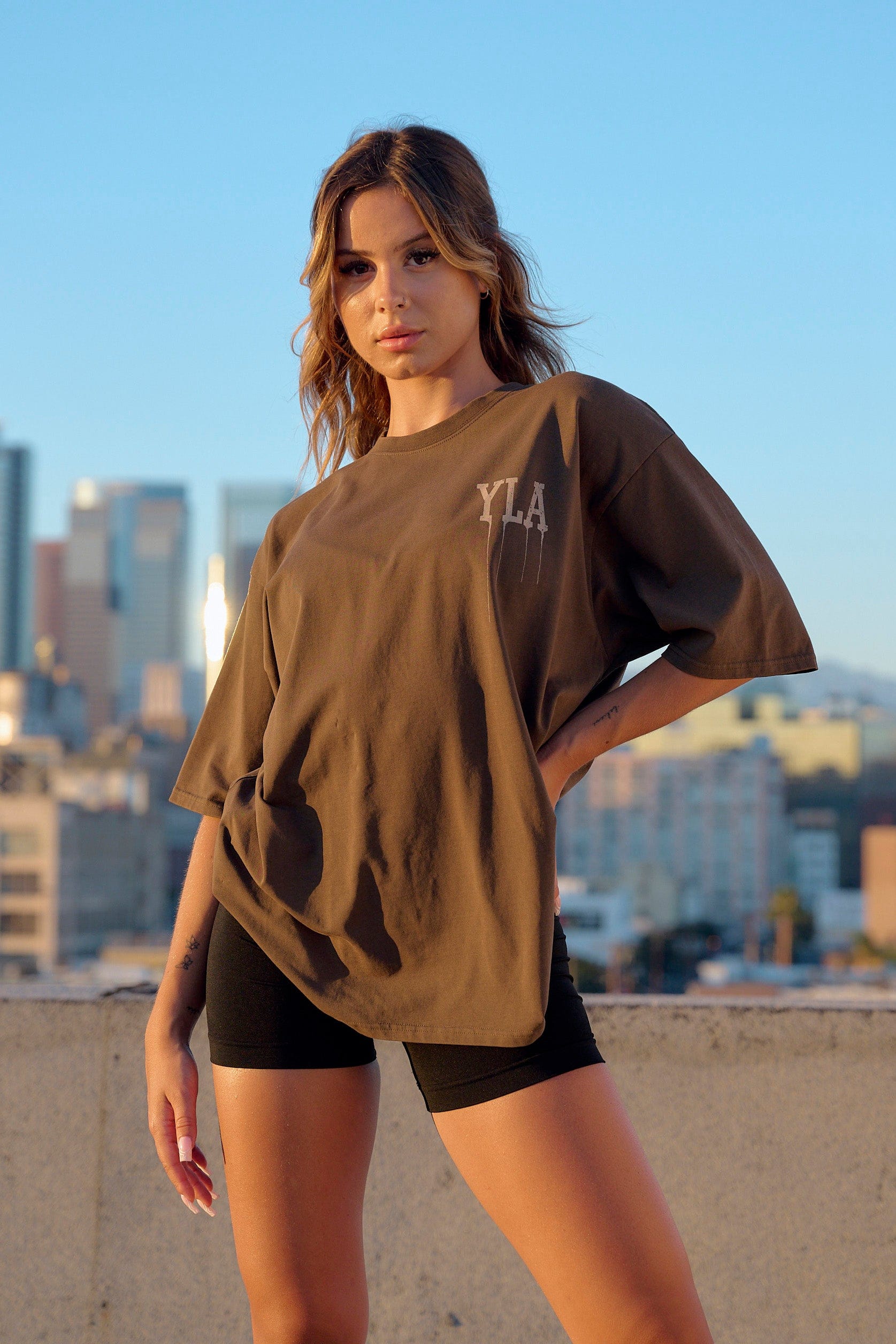 Street-style shot of heavy cotton t shirts paired with jeans in downtown LA