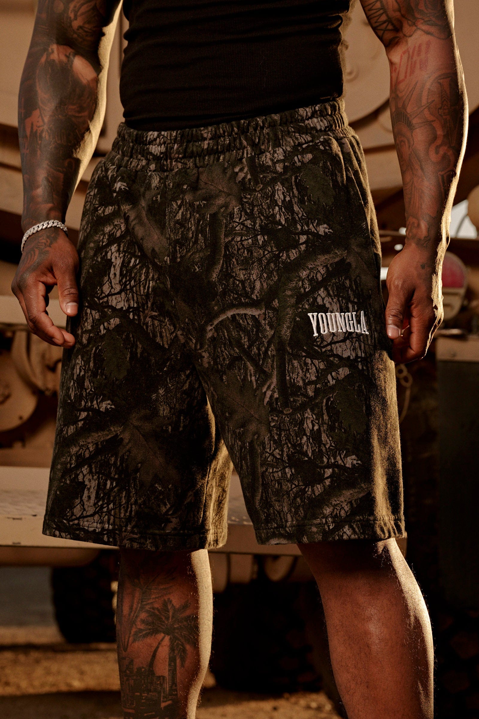 Model wearing Heritage baggy shorts with a casual top, highlighting the comfortable cotton fabric