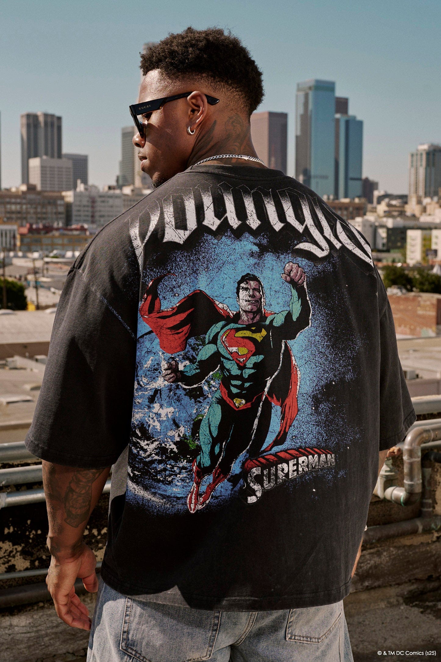 Front view of the huge graphic superman t shirt with bold logo print
