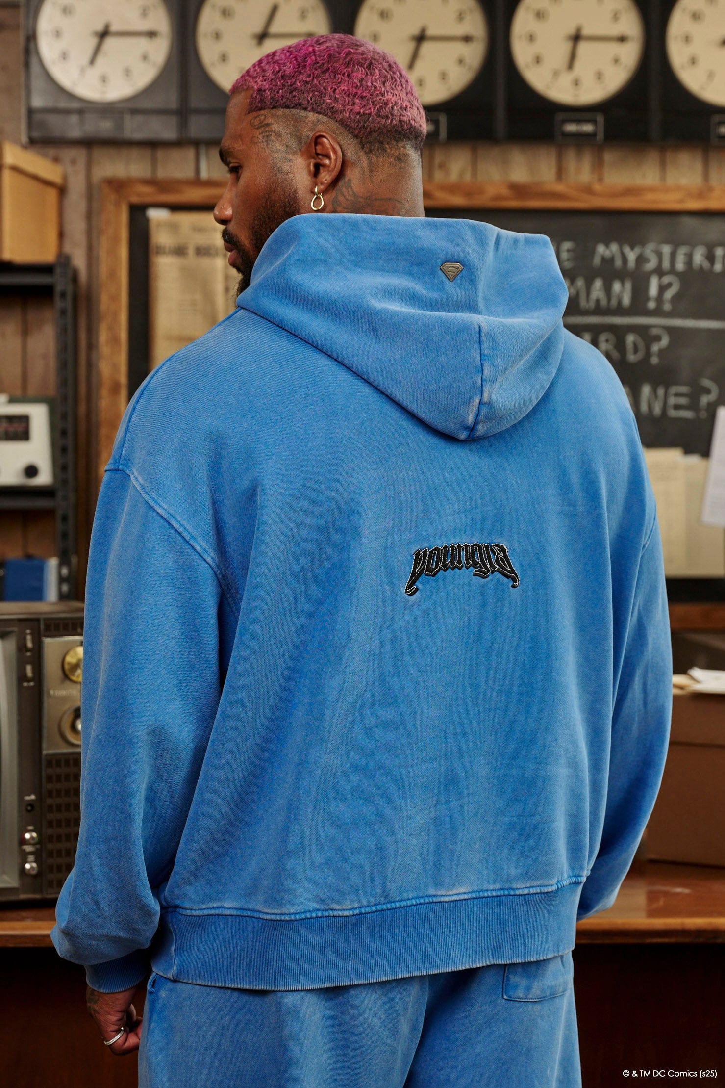 Front view of the Superman Legacy oversized hoodie with logo.