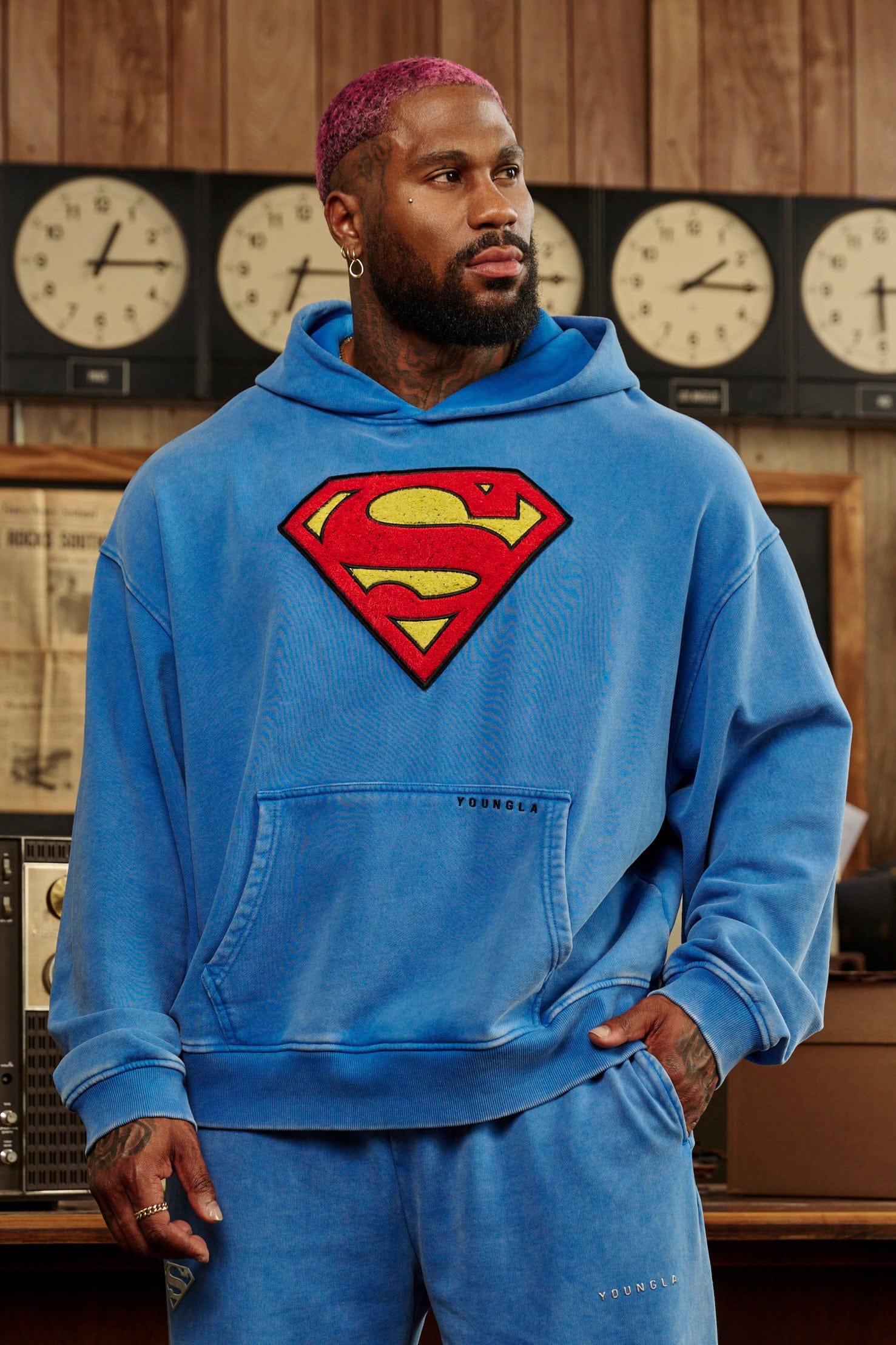 Front view of the Superman Legacy oversized hoodie with logo.