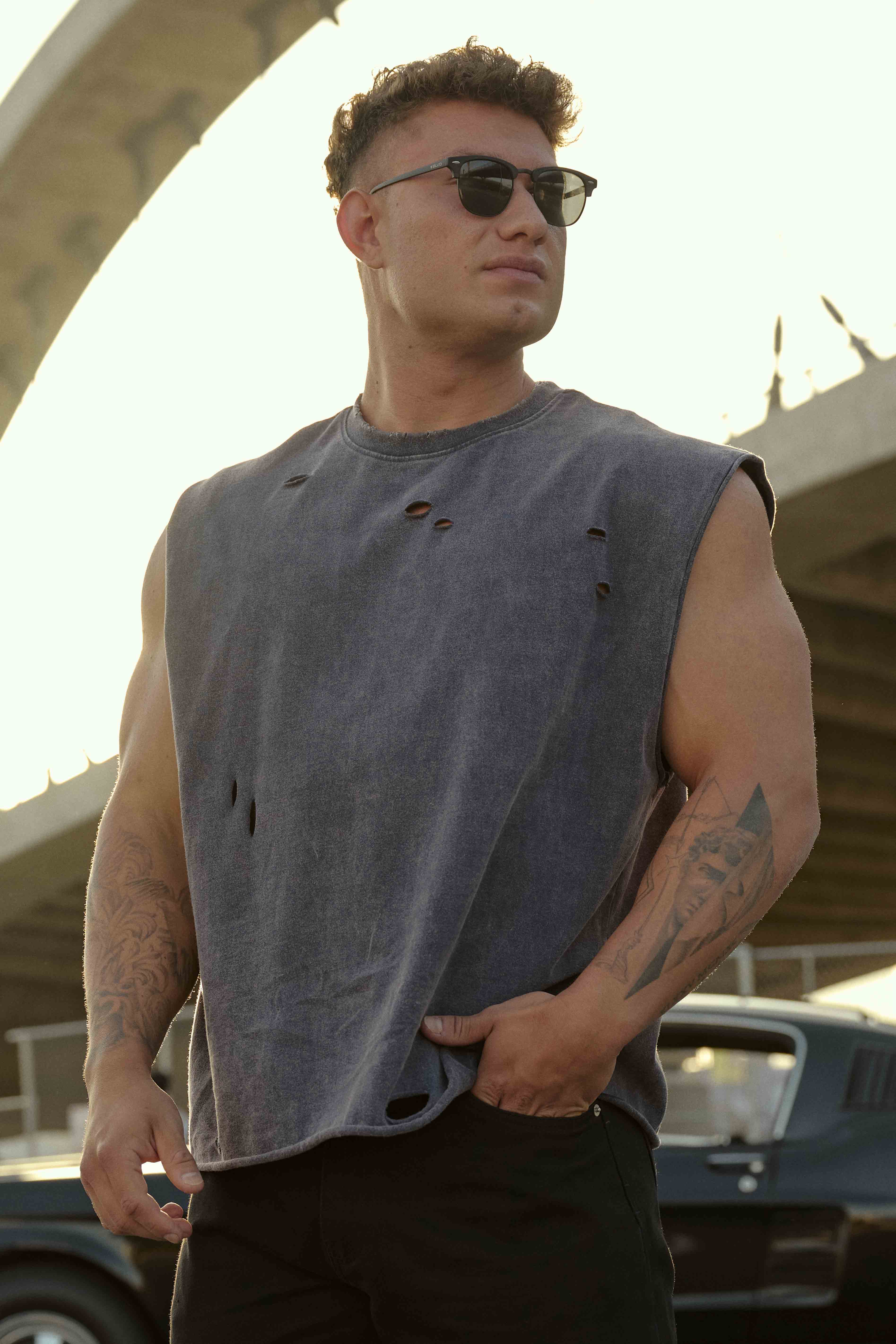 Back view showcasing the distressed print of the Anarchy Edge Crop Tank Top.