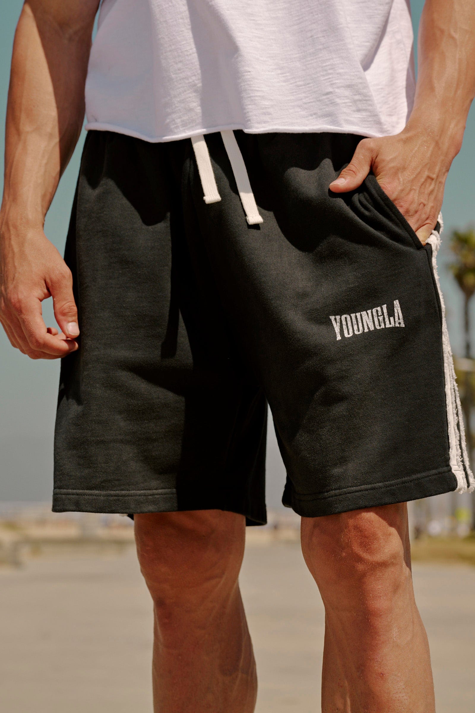 Front view of retro striped sweat shorts for women, showcasing the unique design.