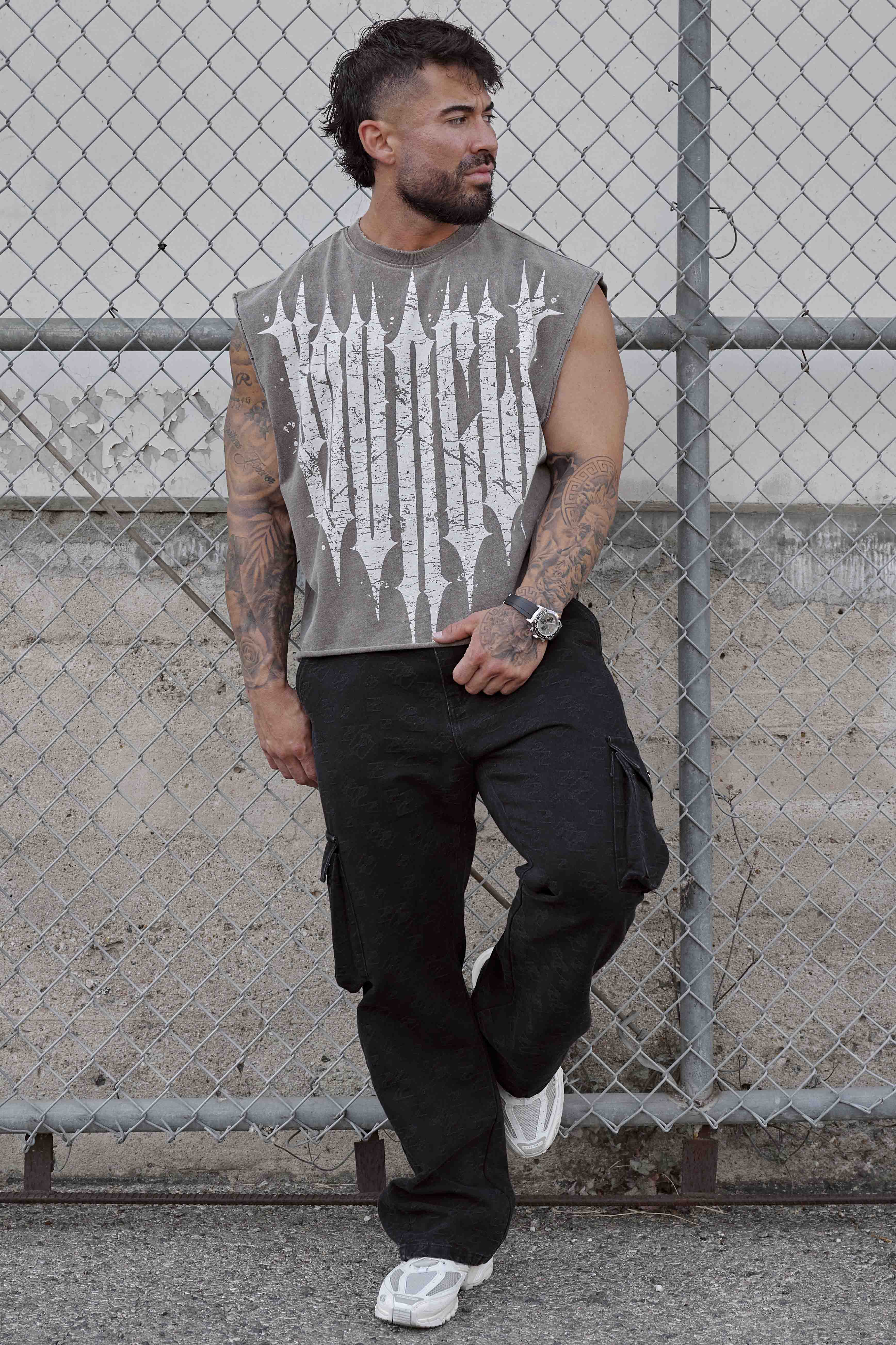 Side angle of the tank top worn casually in an urban setting.