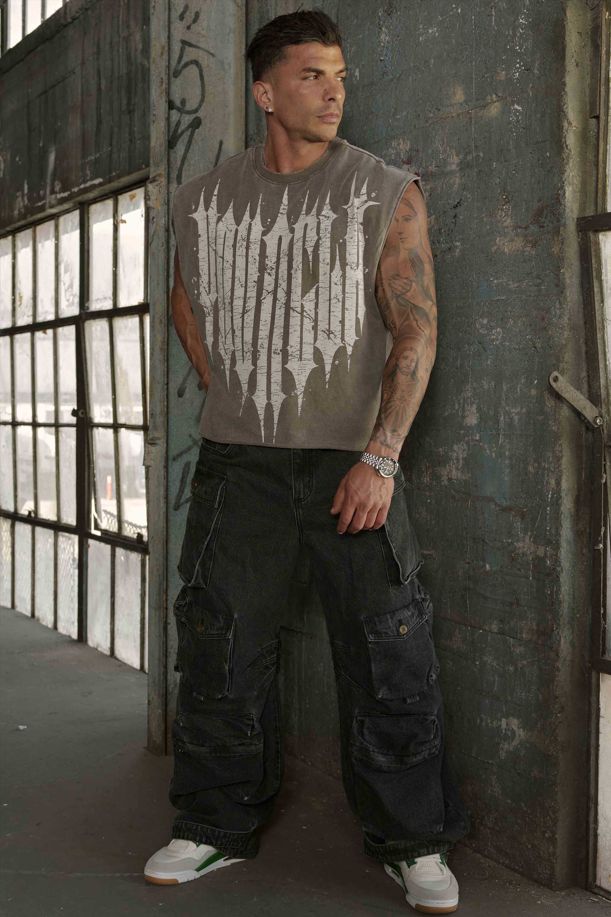 Side angle of the tank top worn casually in an urban setting.
