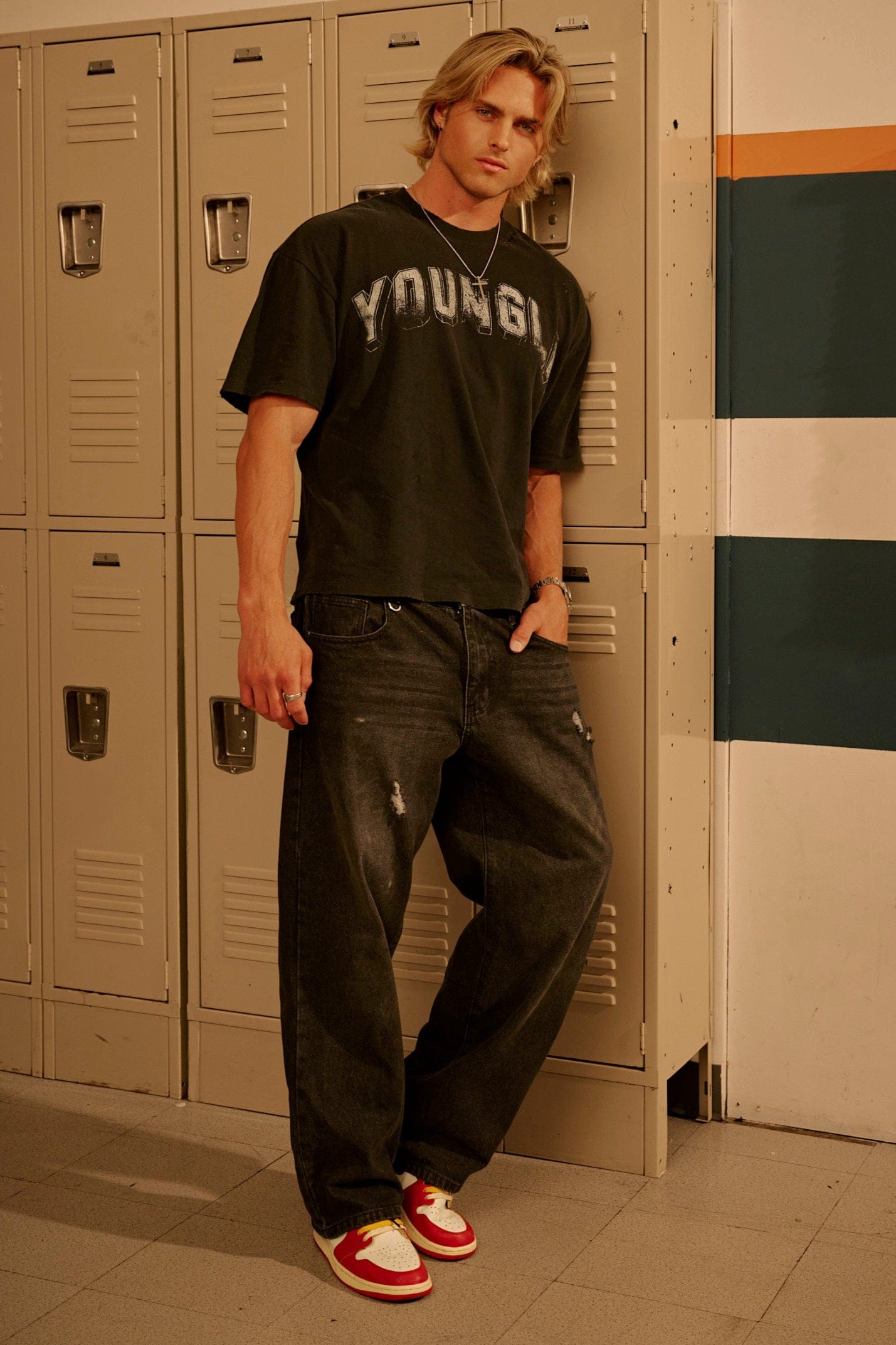 Essential loose fit jeans on model, showcasing 90s-inspired baggy silhouette