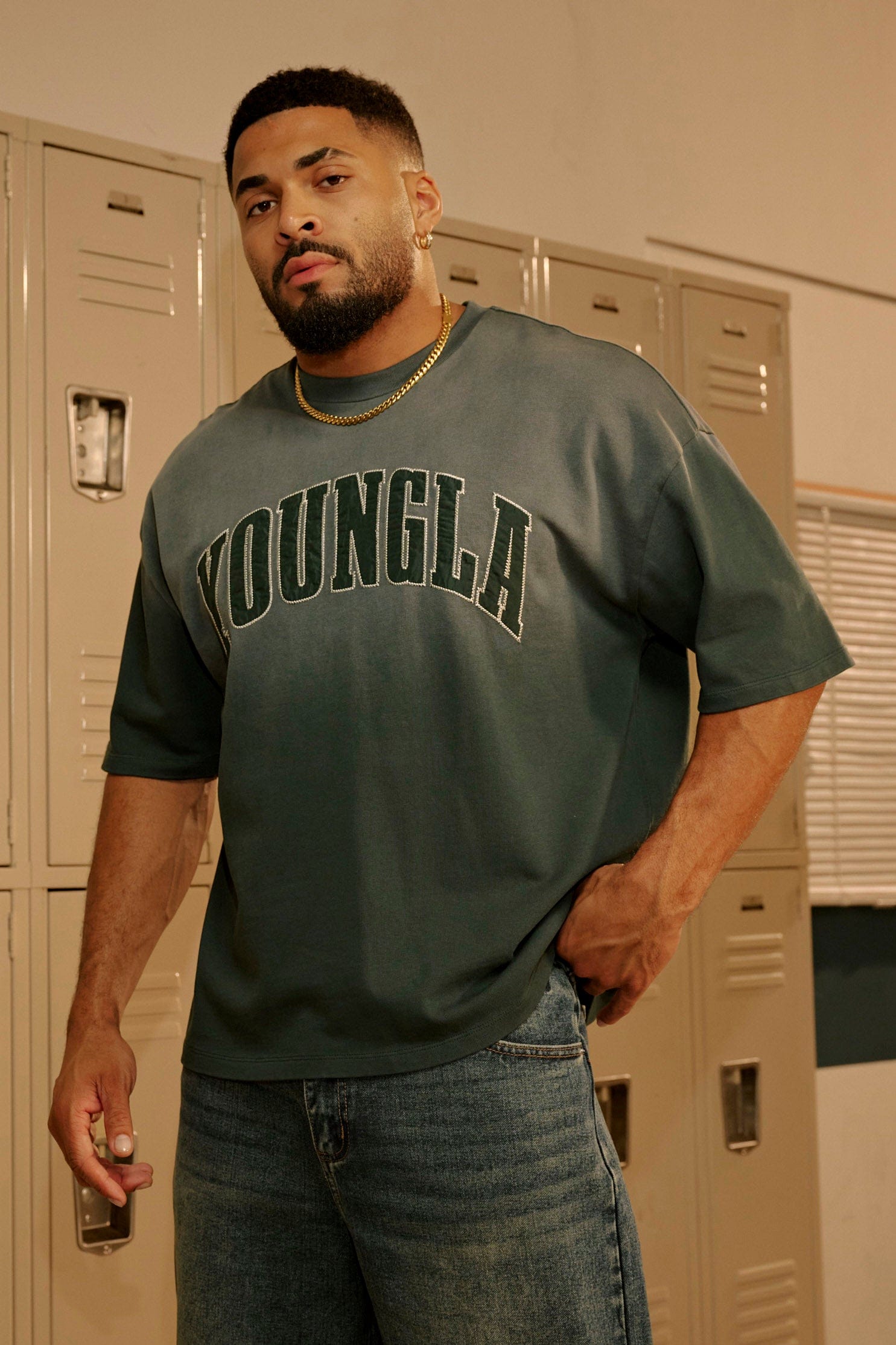 Back detail of oversized t-shirts showing relaxed drop shoulder fit and washed texture