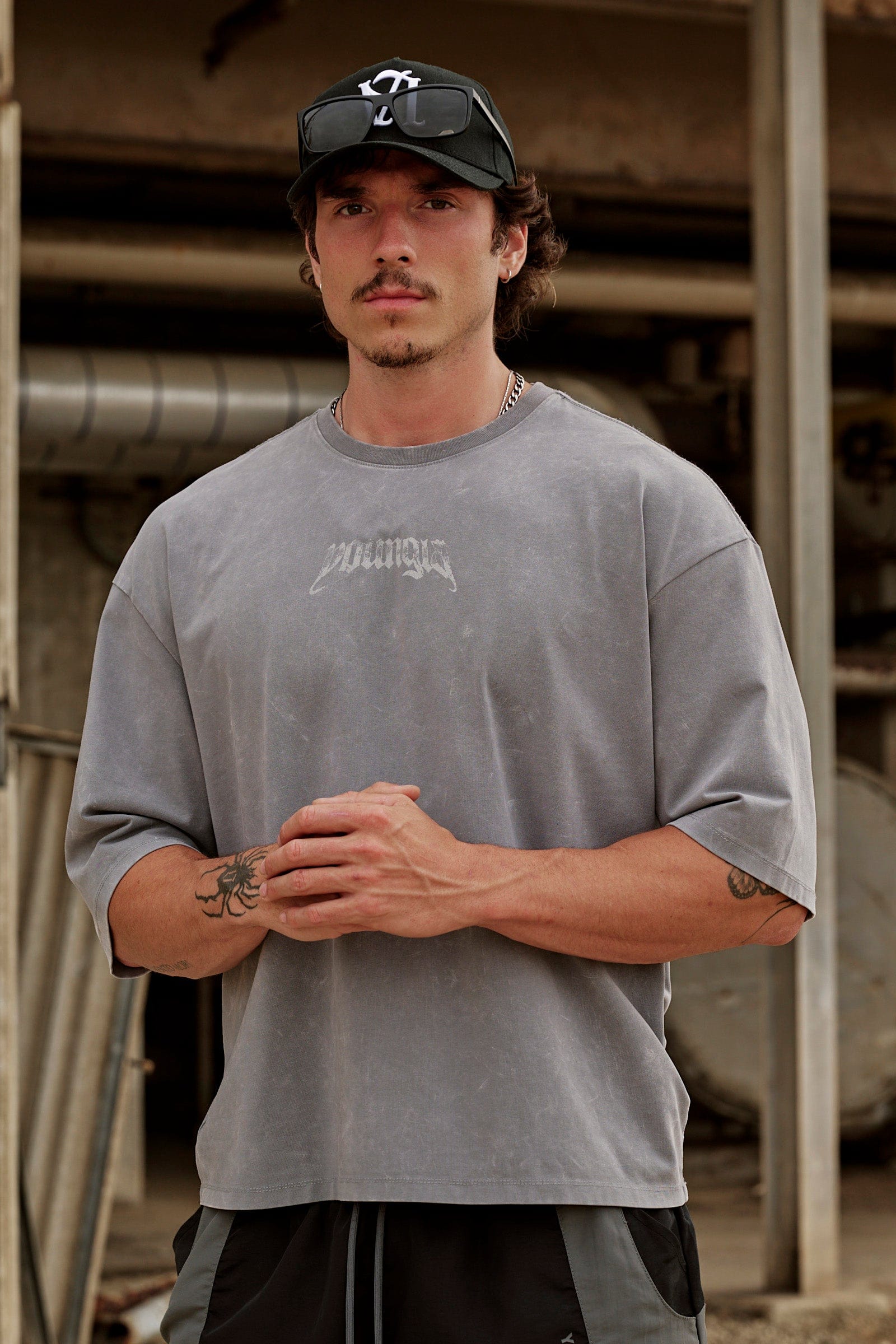 Close-up of vintage acid wash oversized t shirt fabric showing texture and design details