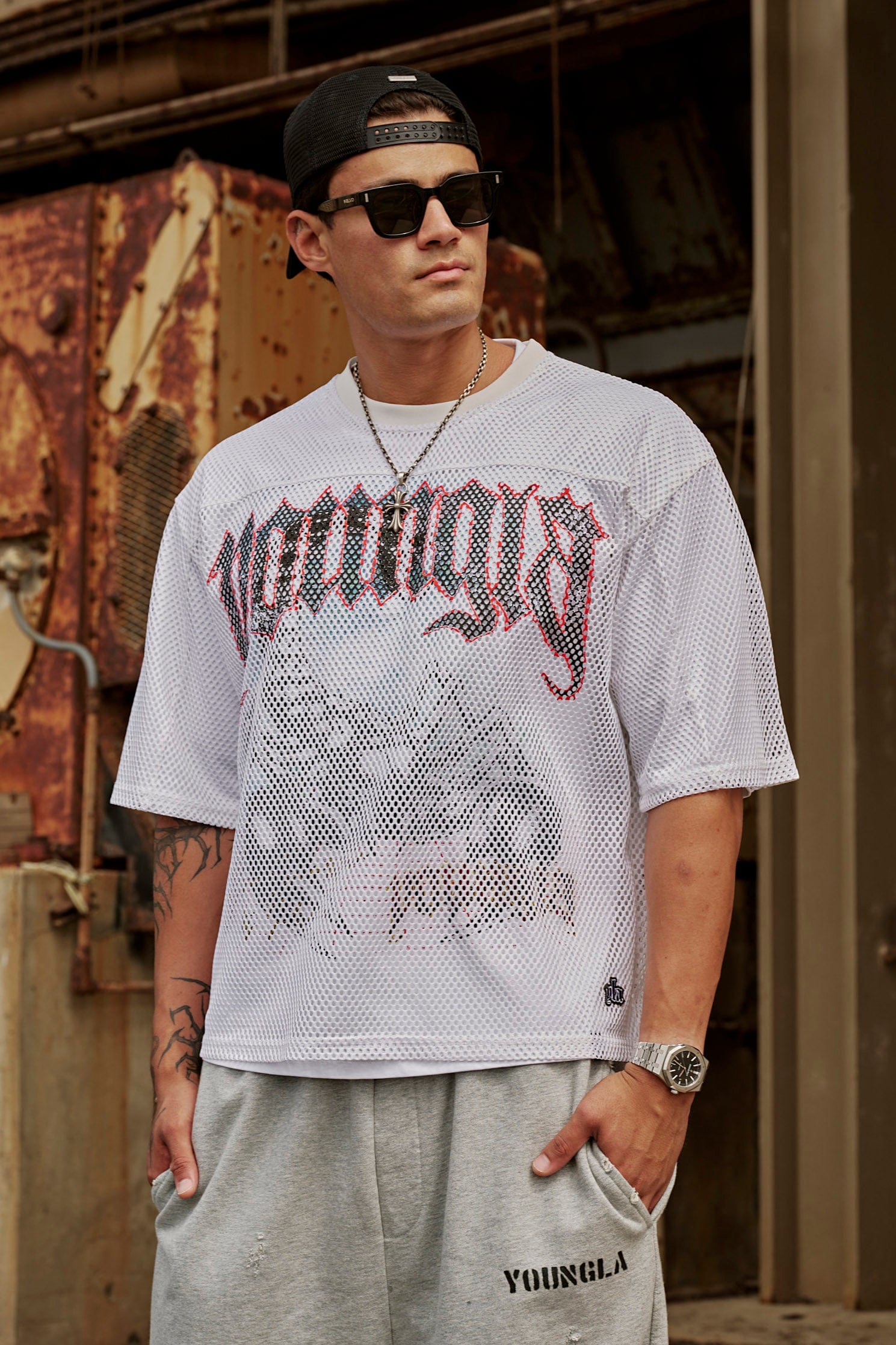 Front view of the Scorpion graphic tee and jersey set on a model