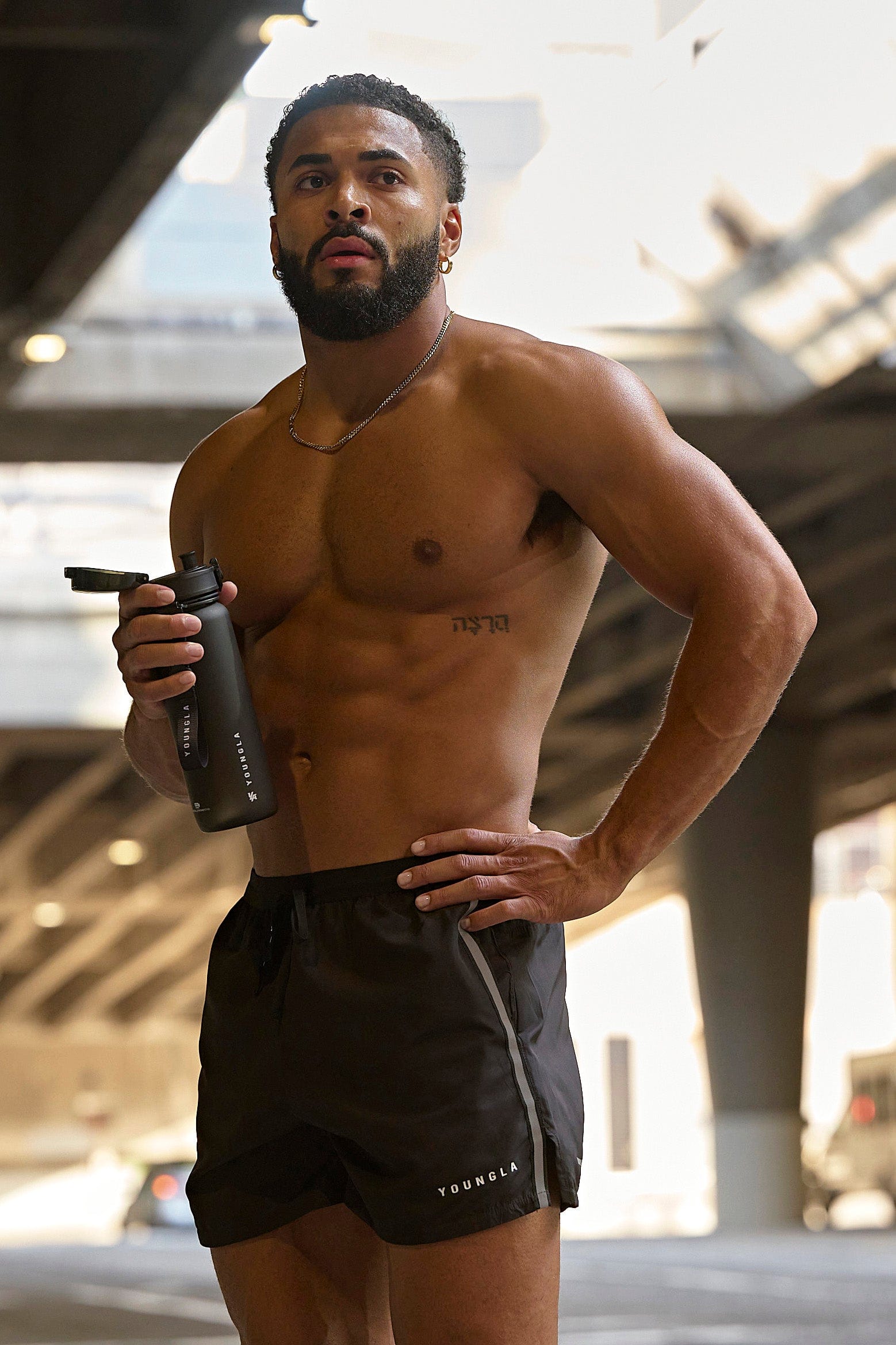 Side view showcasing reflective piping on running shorts