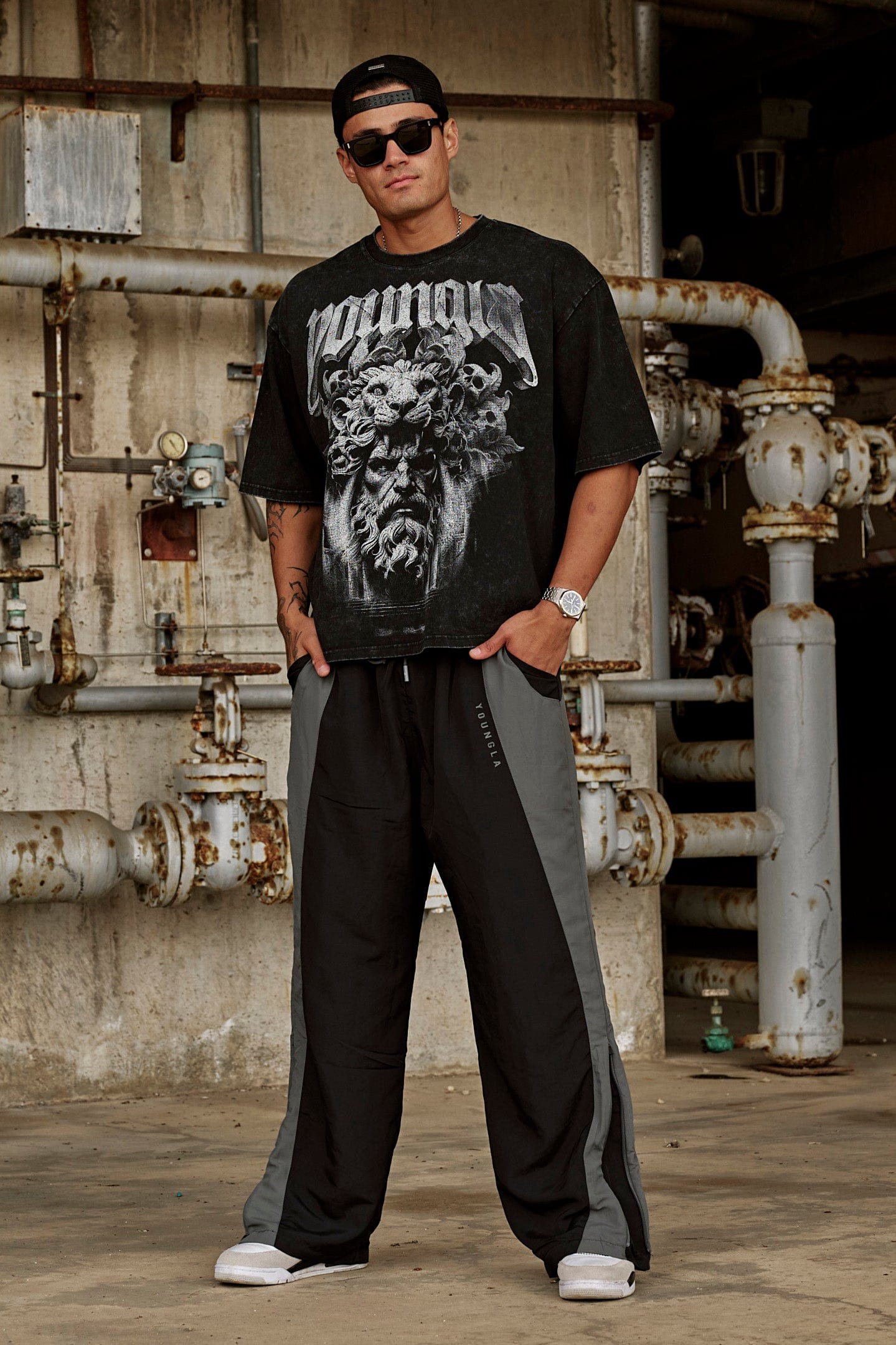 Streetwear model wearing oversized gods & heroes t-shirt