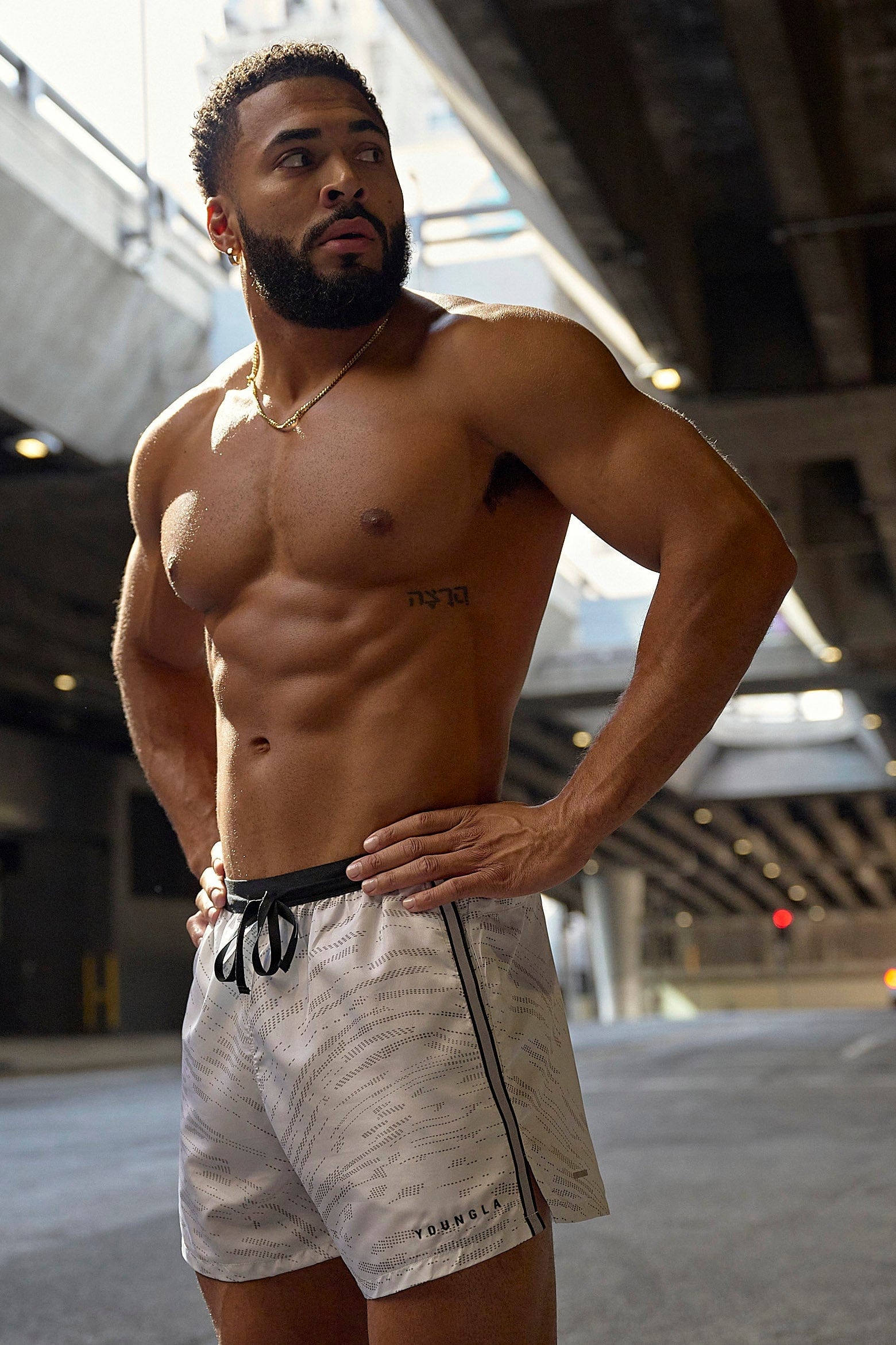 Model wearing ultra running shorts during a morning jog