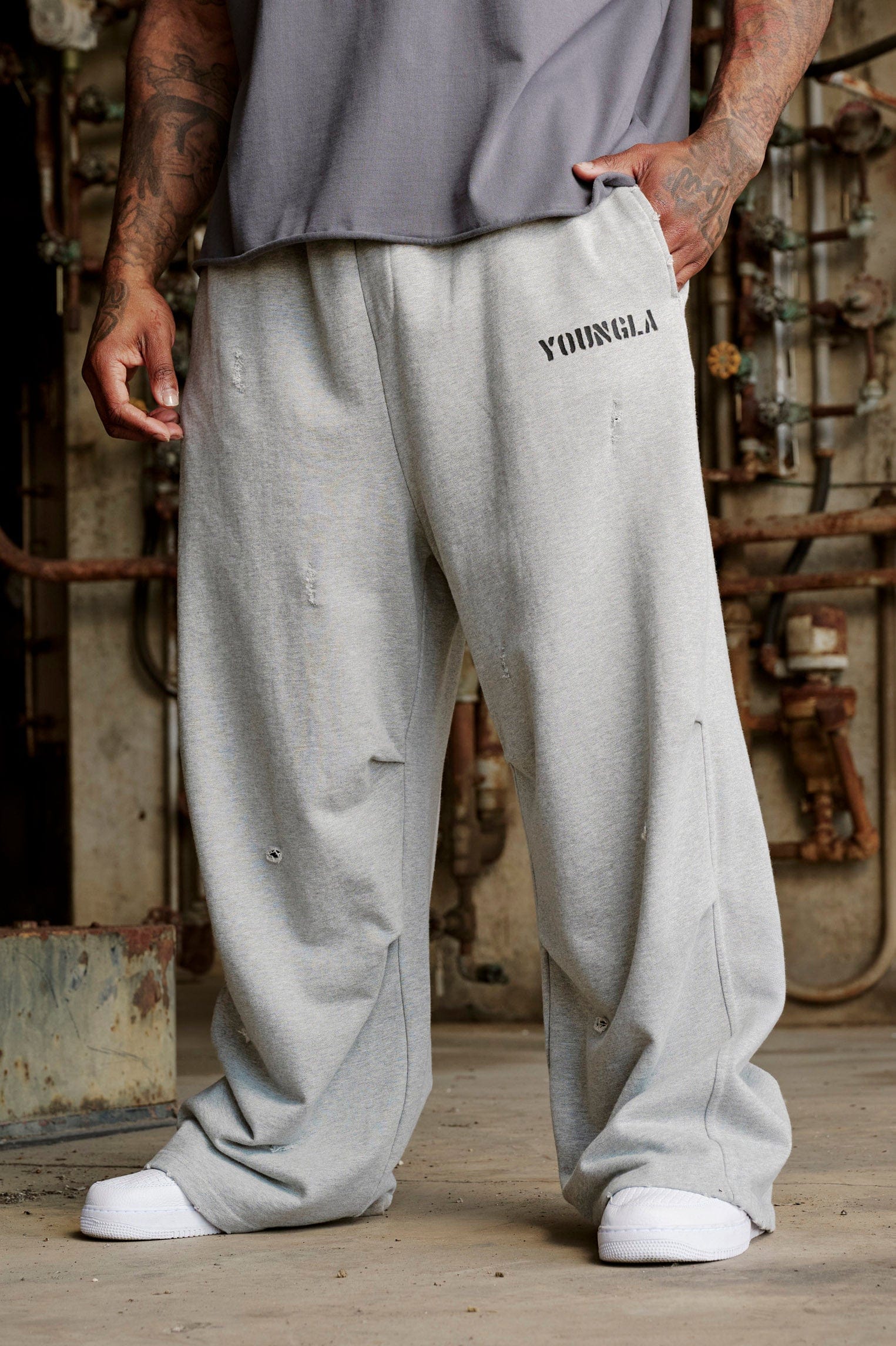 Close-up of the raw distress cuts on the Urban Edge sweatpants.
