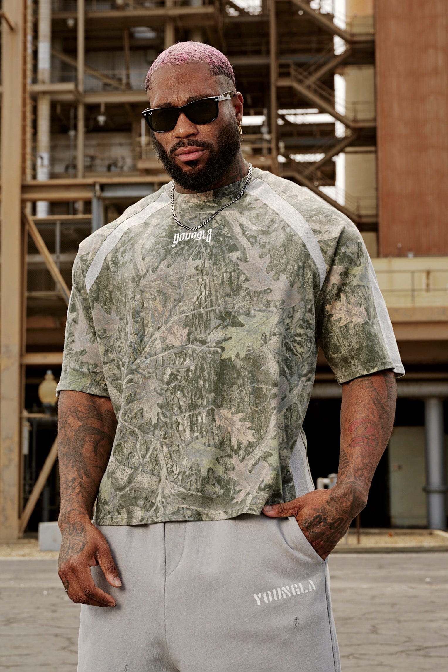 Close-up of the raglan paneling on the oversized t-shirt.