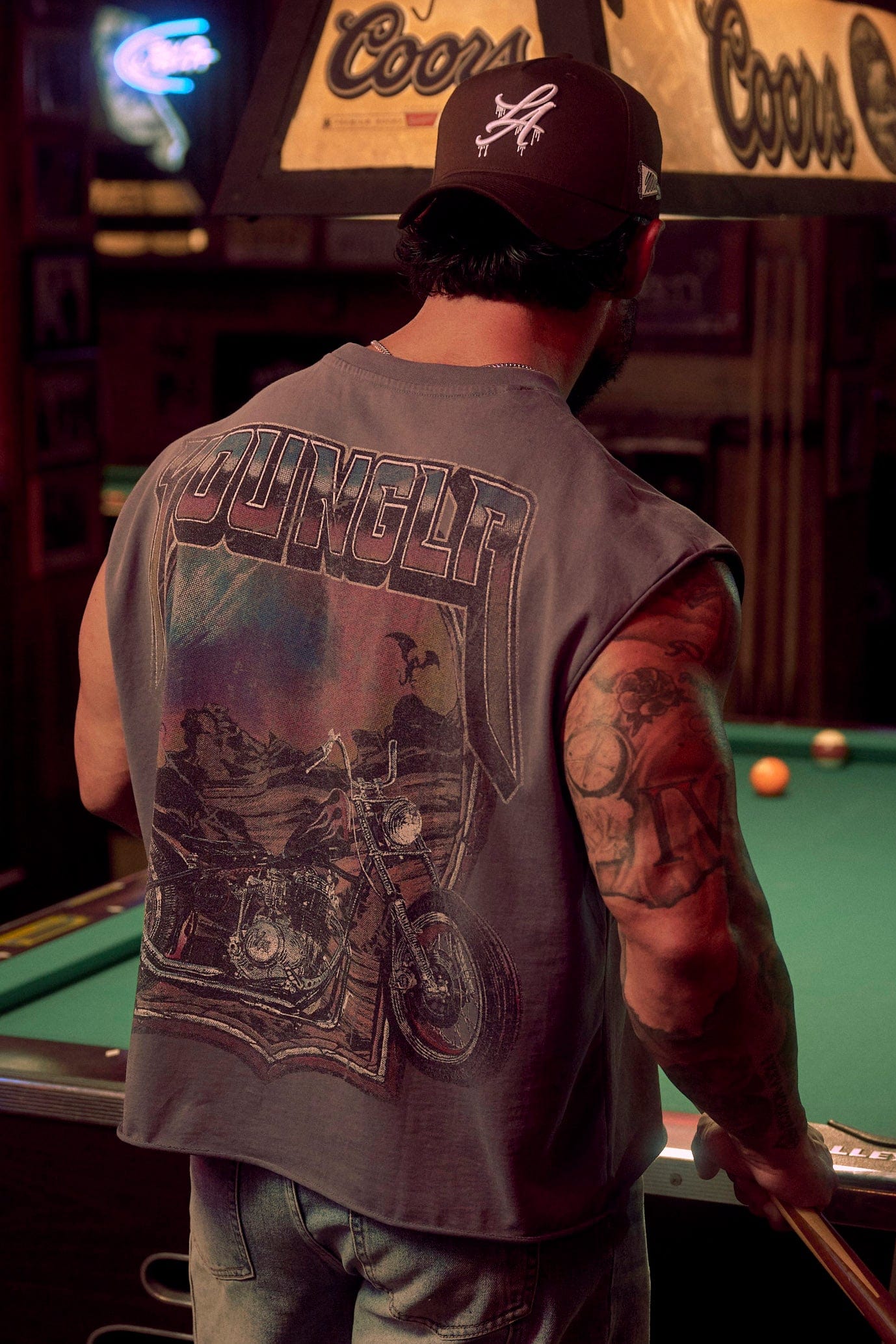 Close-up of distressed graphic on retro biker tank top