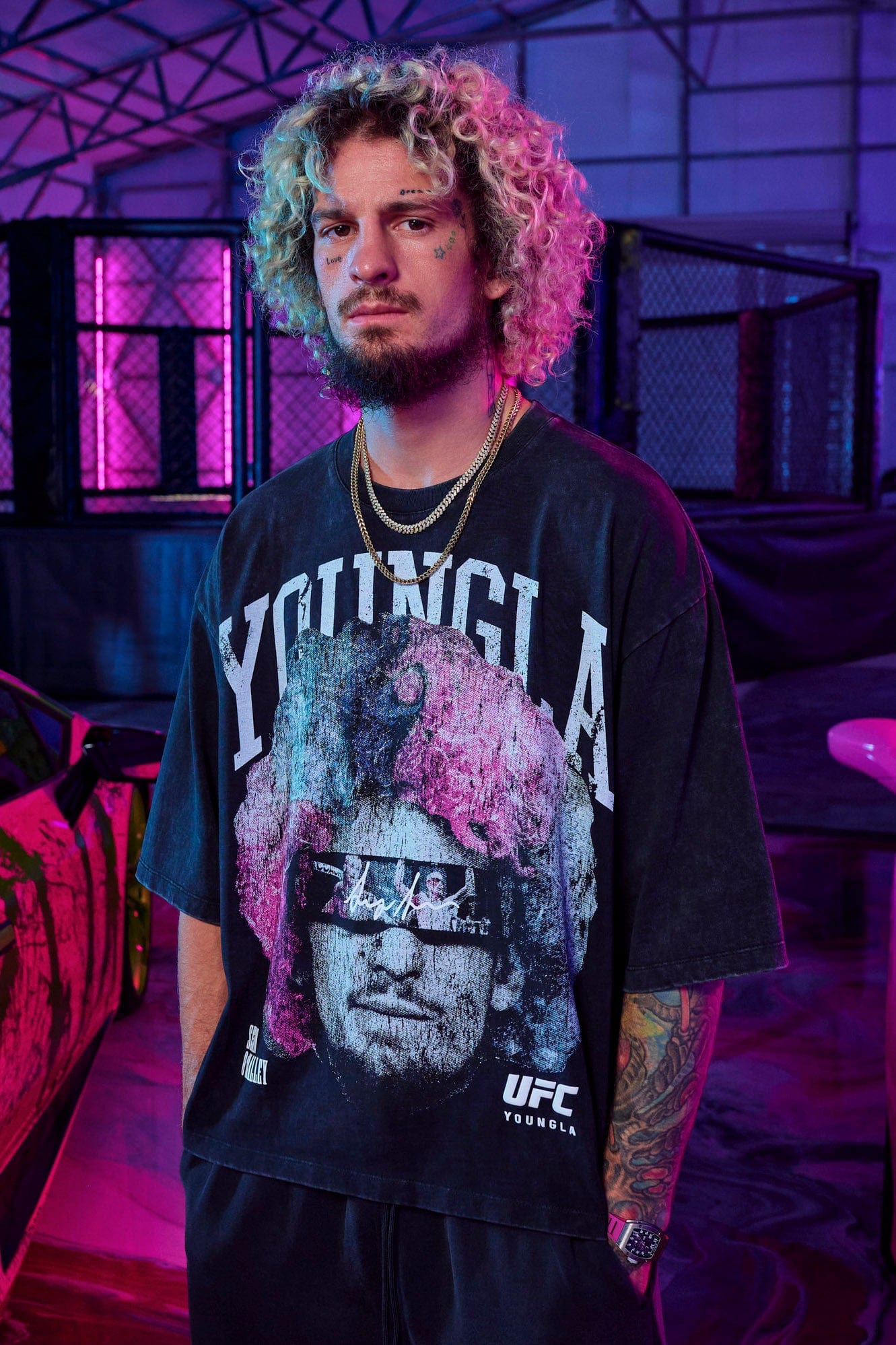 Side view of MMA apparel showing relaxed cropped fit and fabric texture