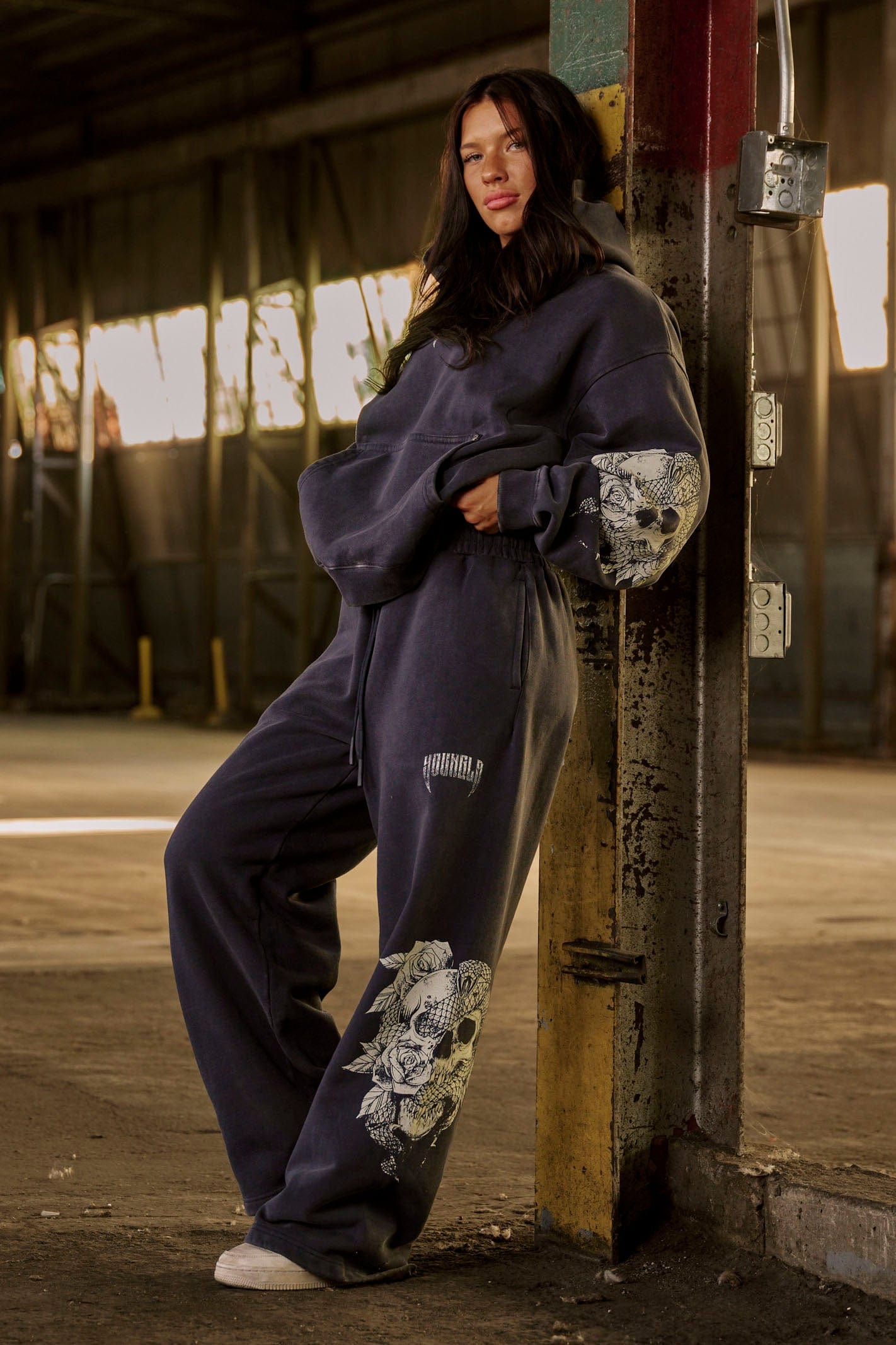 Close-up of the elastic waistband on the graphic sweatpants.