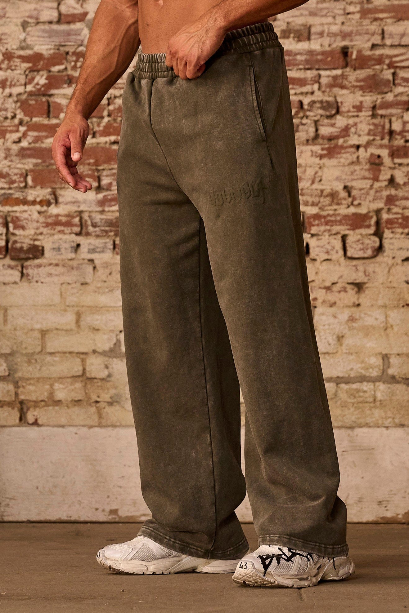 Front view of relaxed fit joggers highlighting the tonal logo and vintage look