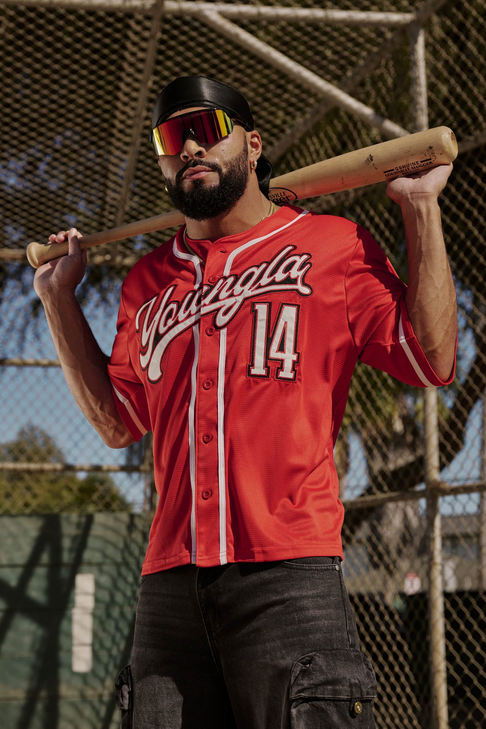 Model wearing the Grand Slam jersey, demonstrating its relaxed fit.