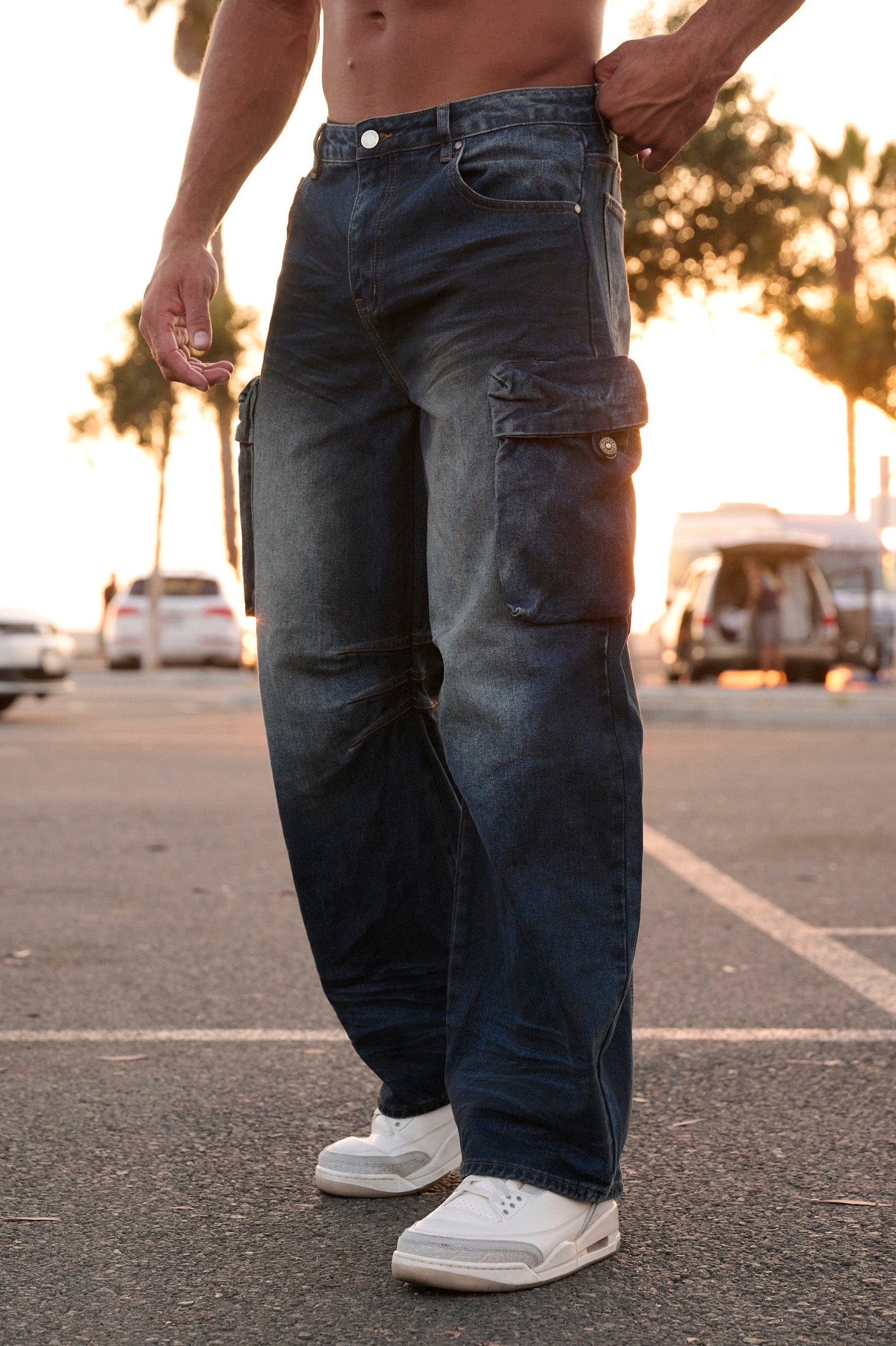 Front view of cargo jeans highlighting large cargo pockets and vintage wash
