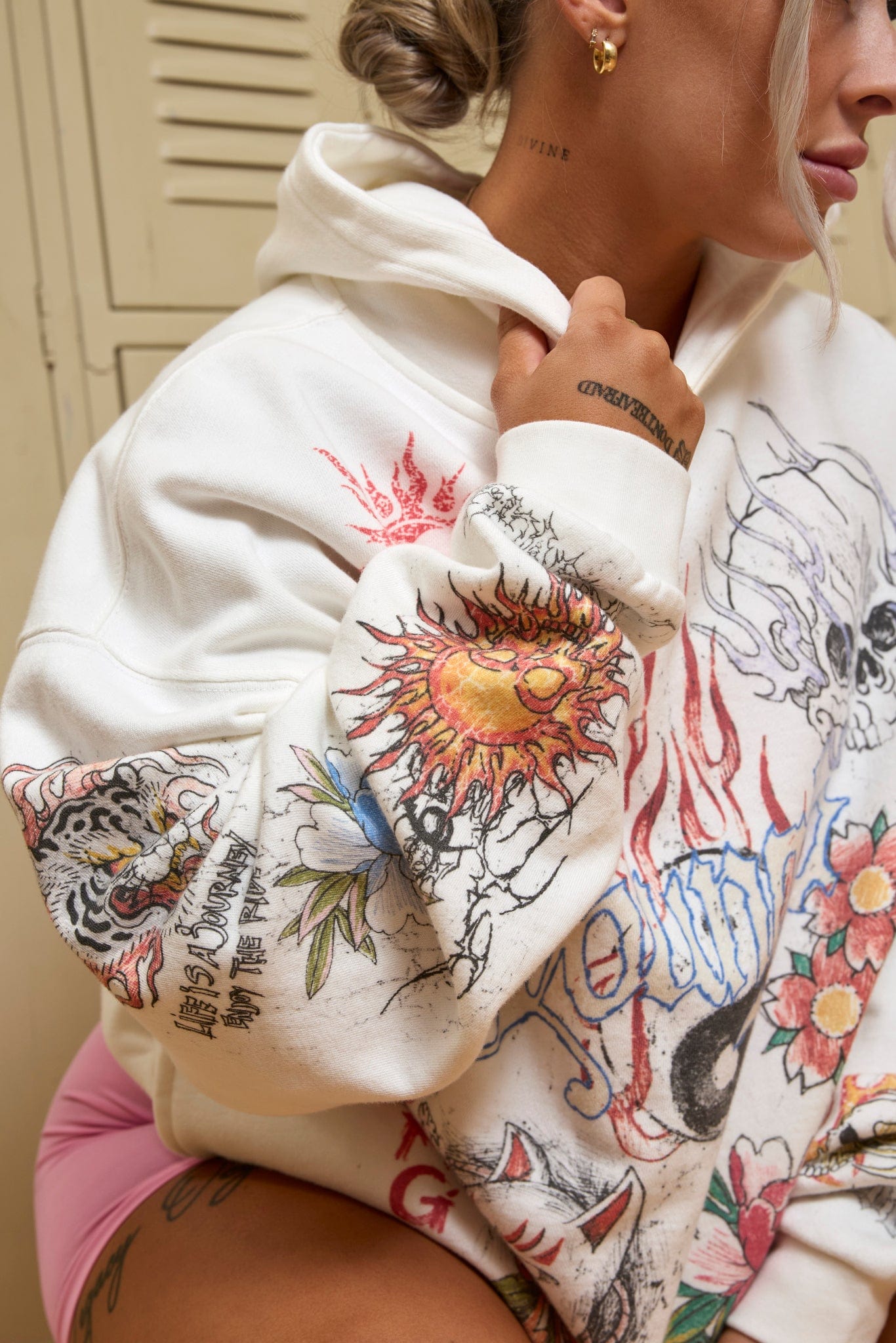 Side profile of comfort hoodie showing relaxed fit and dropped shoulders