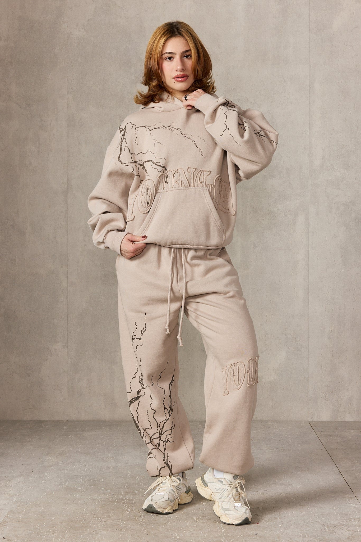 Side view of joggers showcasing the YoungLA logo.