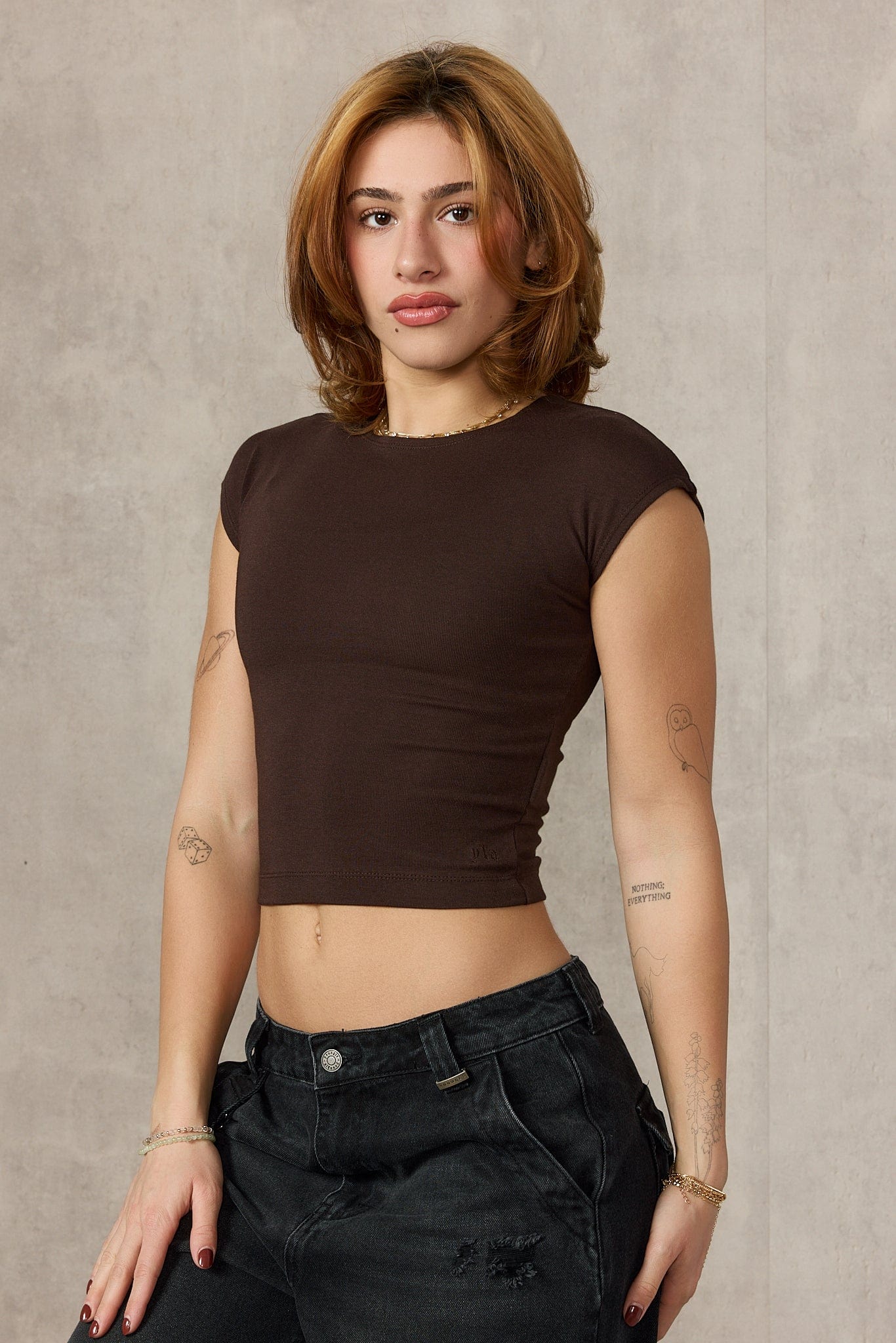 Detail shot of the textured fabric and stitching on this women’s t-shirt